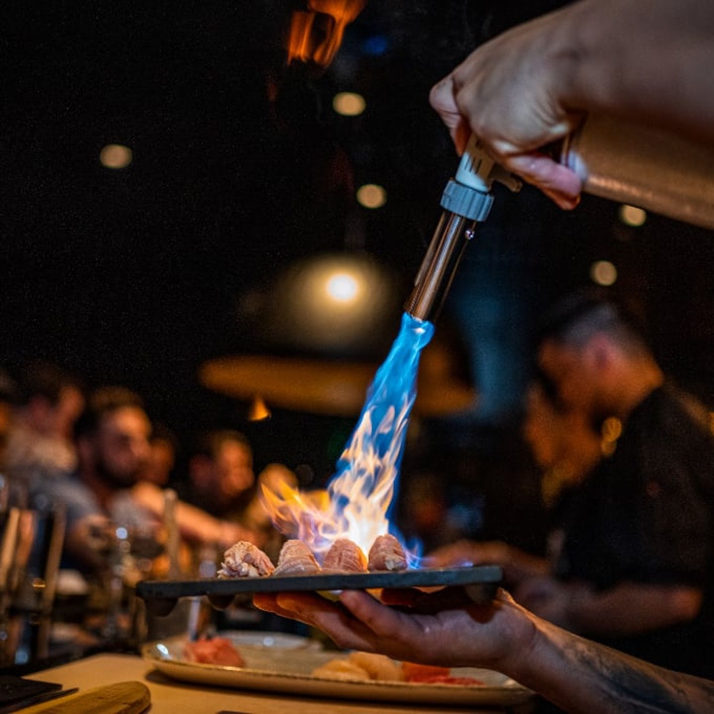 Fish being torched