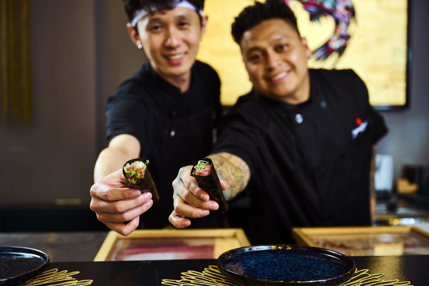 Chef with Sushi Roll