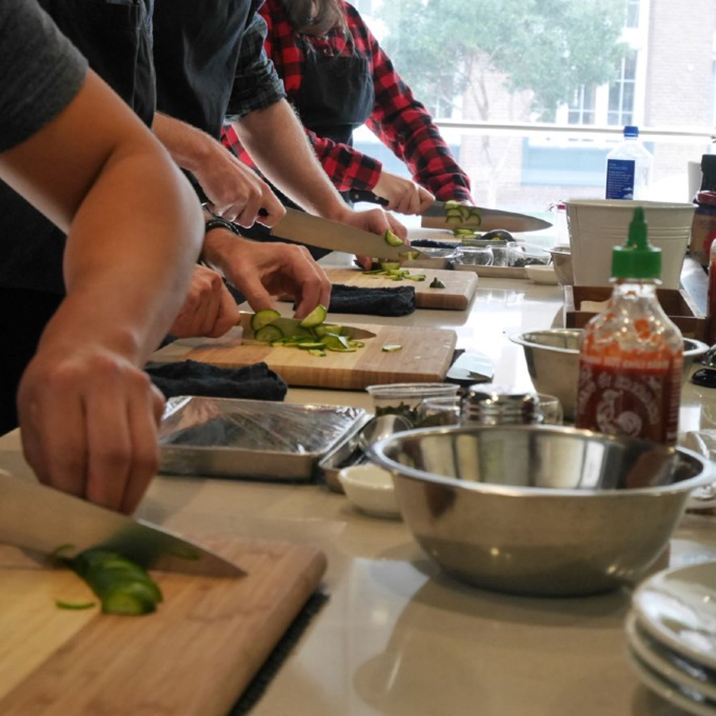 People making sushi