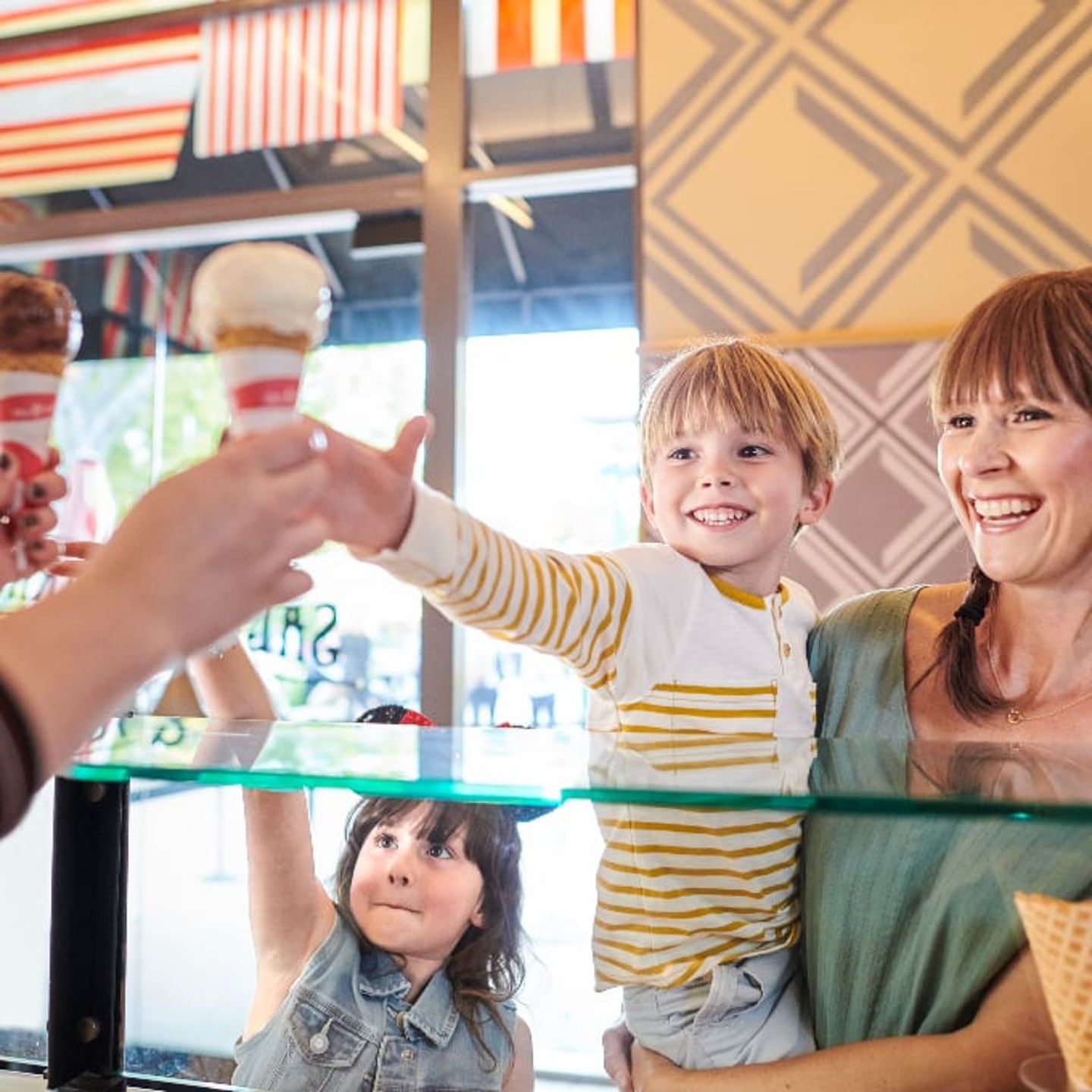 Family getting ice cream at ©Disney