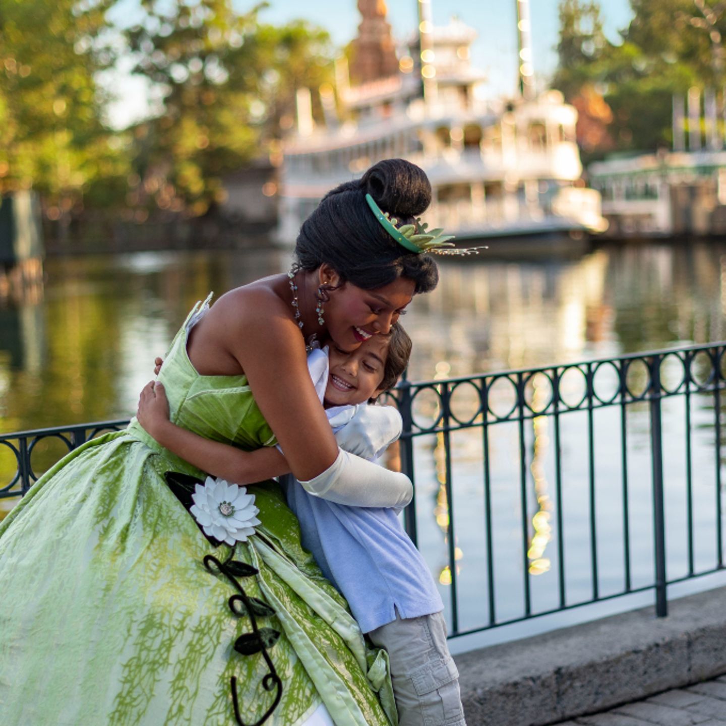 Kid hugging ©Disney Princess Tiana