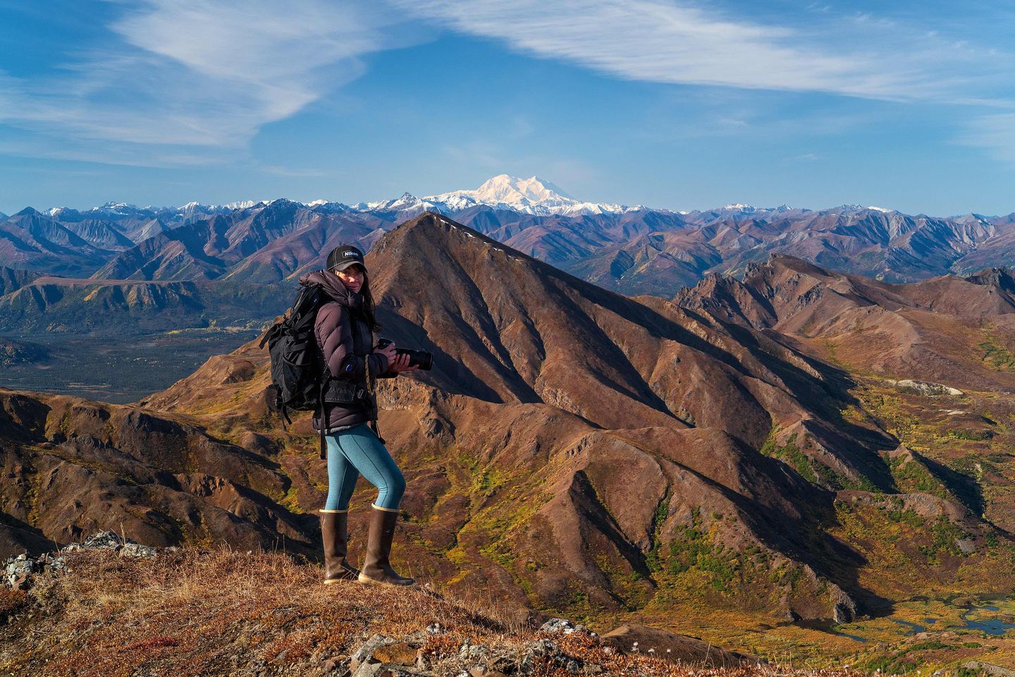 Woman posing on mountain
