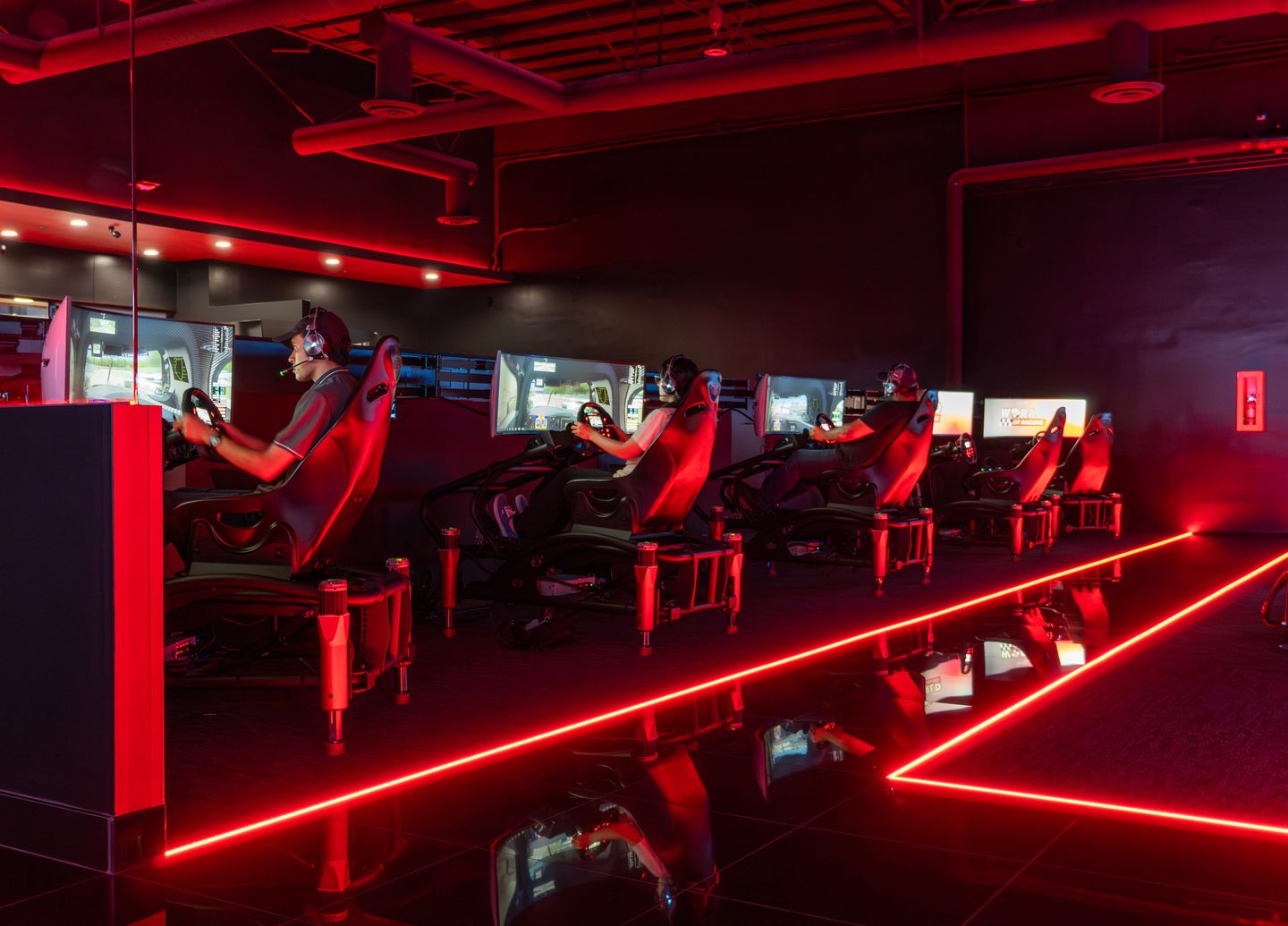 People drving on simulators