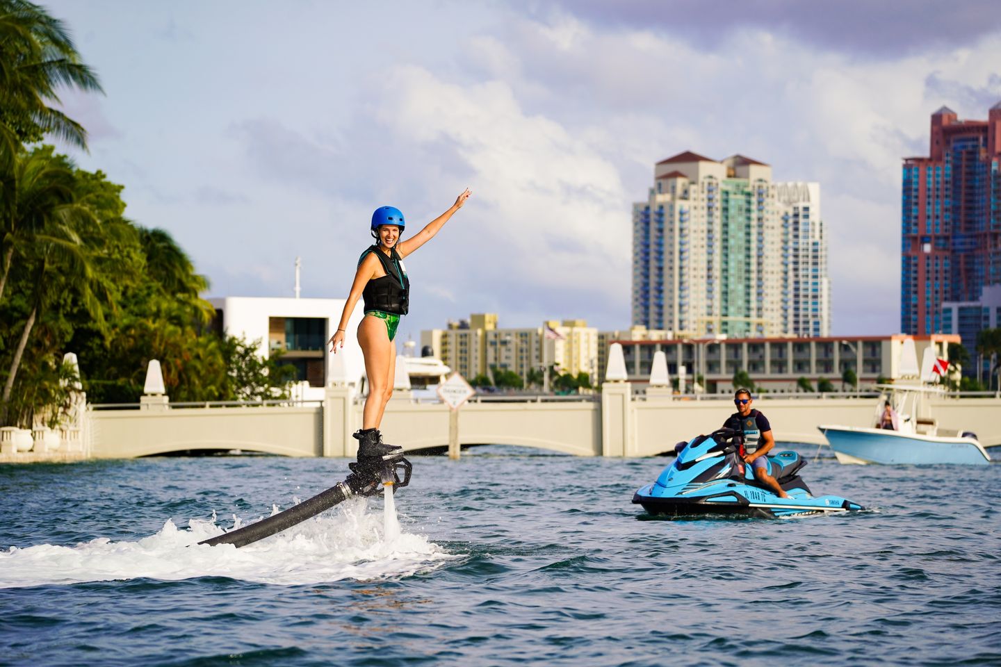 Woman on flyboard in city
