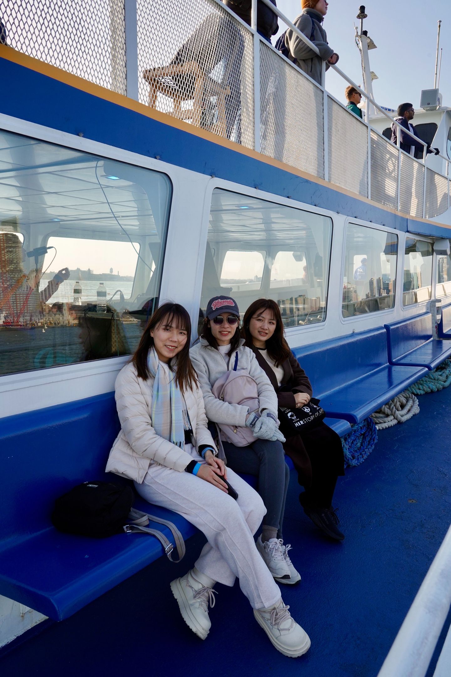 Group sitting on boat