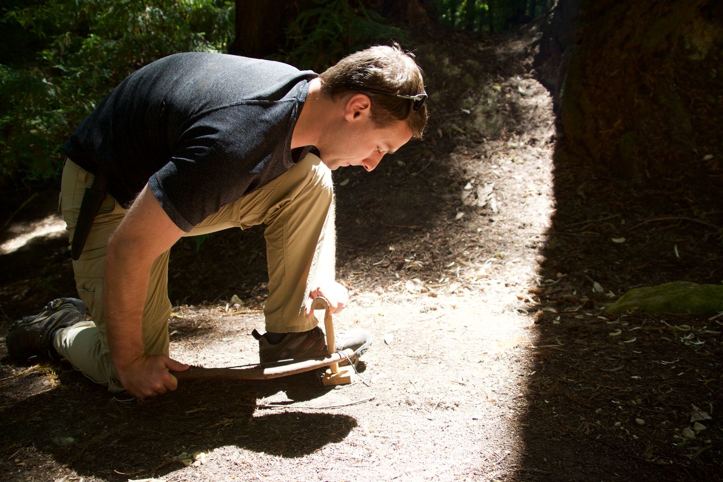Man breaking stick
