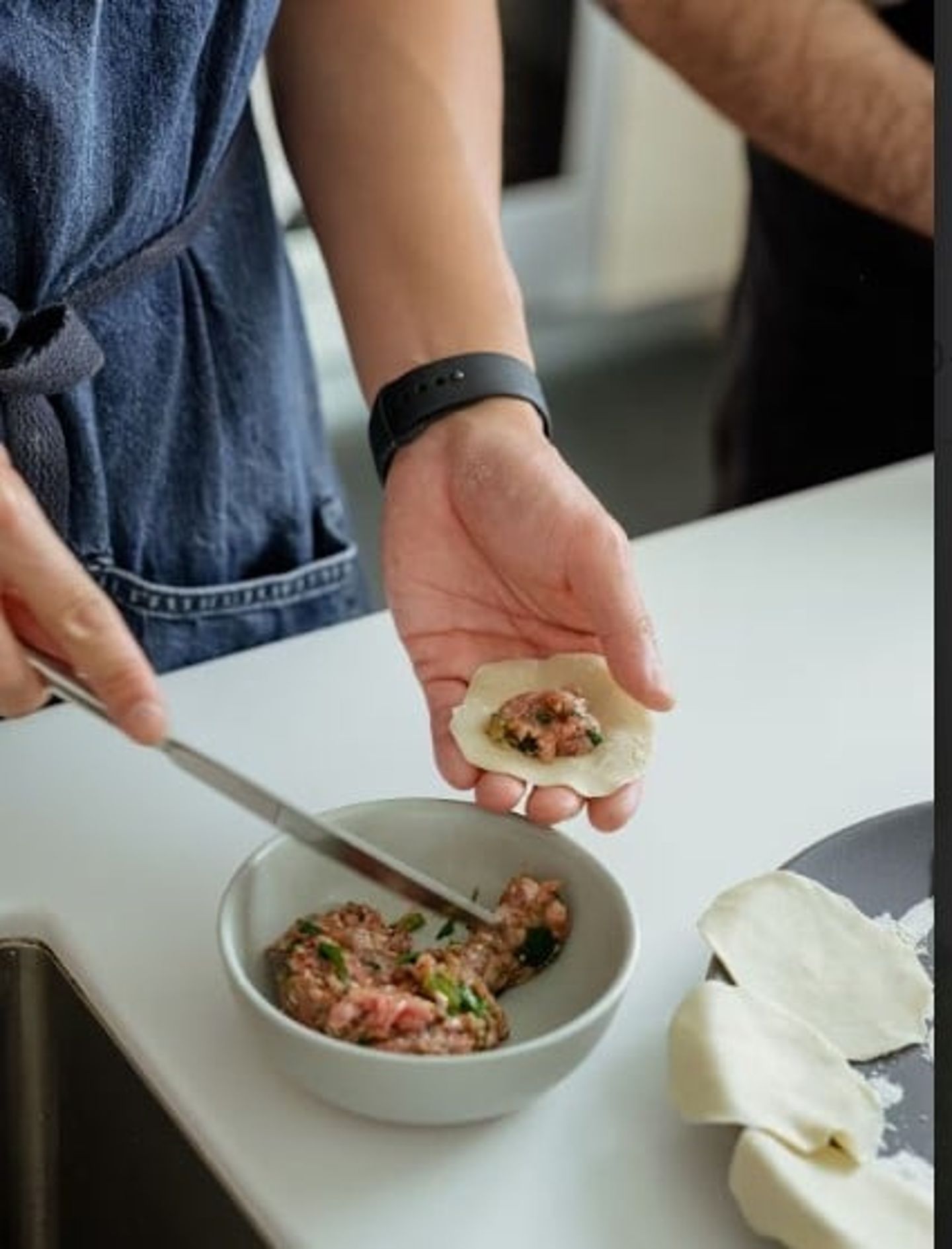 Dumpling being filled