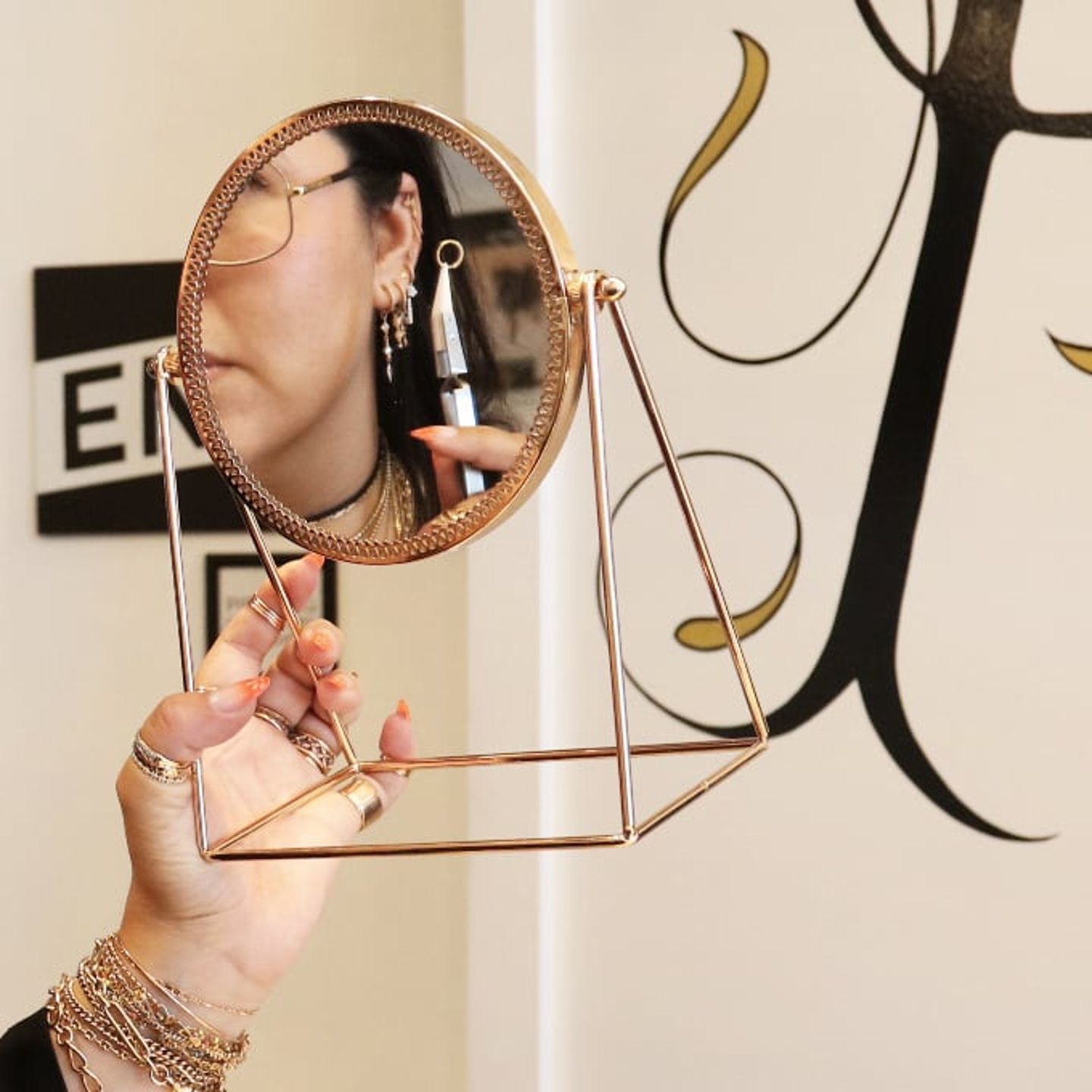 Woman looking at piercing