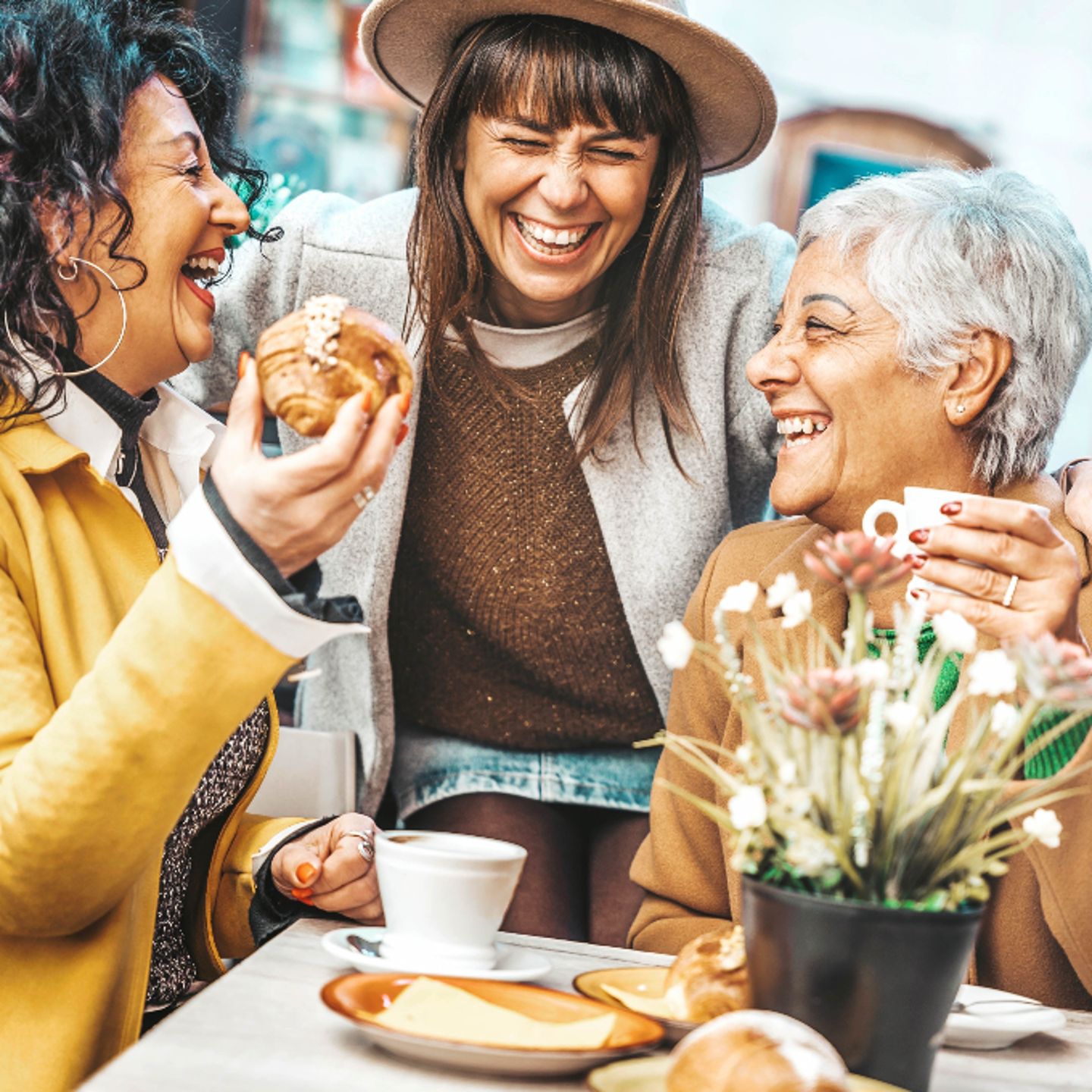 Group enjoying coffee and pastries
