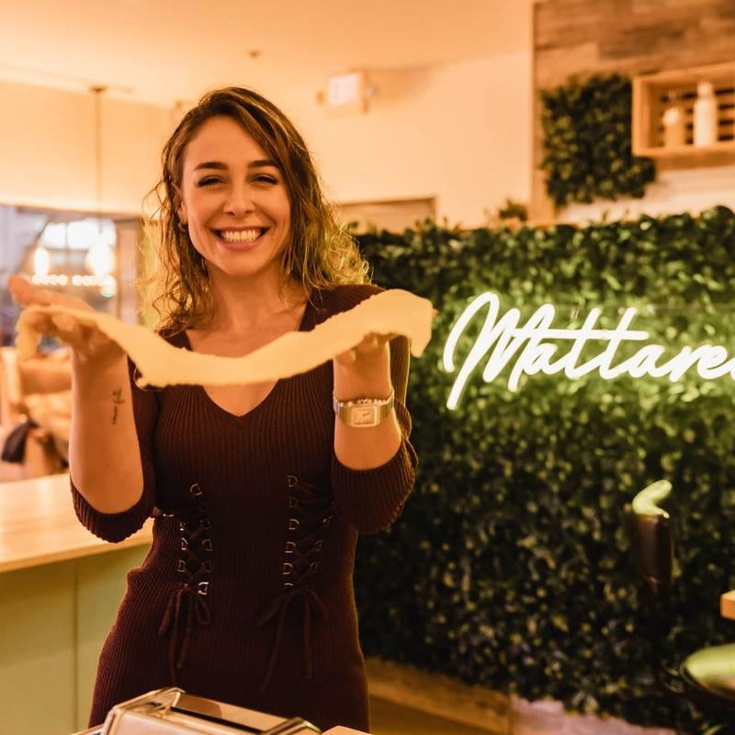 Woman with sheeted pasta