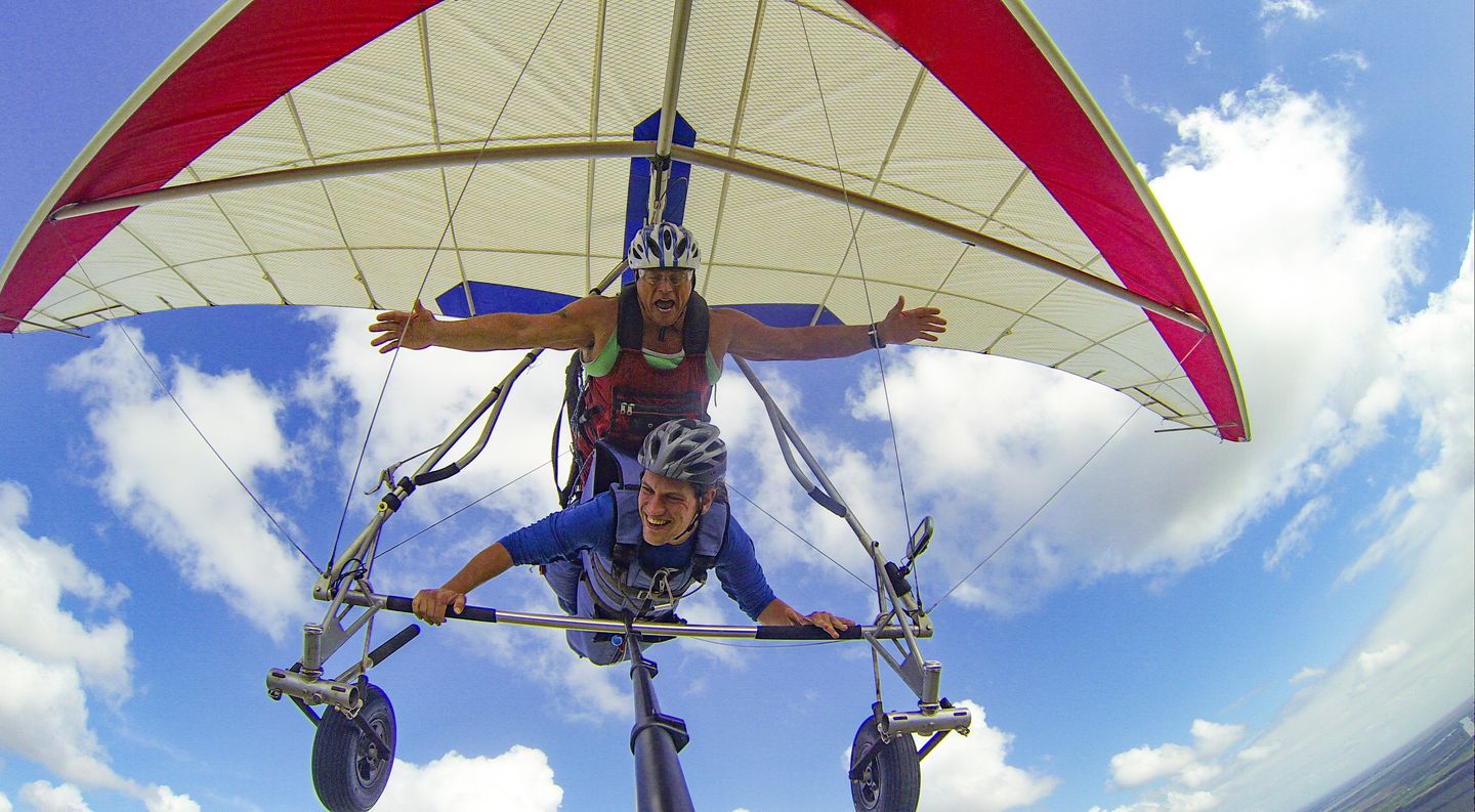 Hang gliding in sky