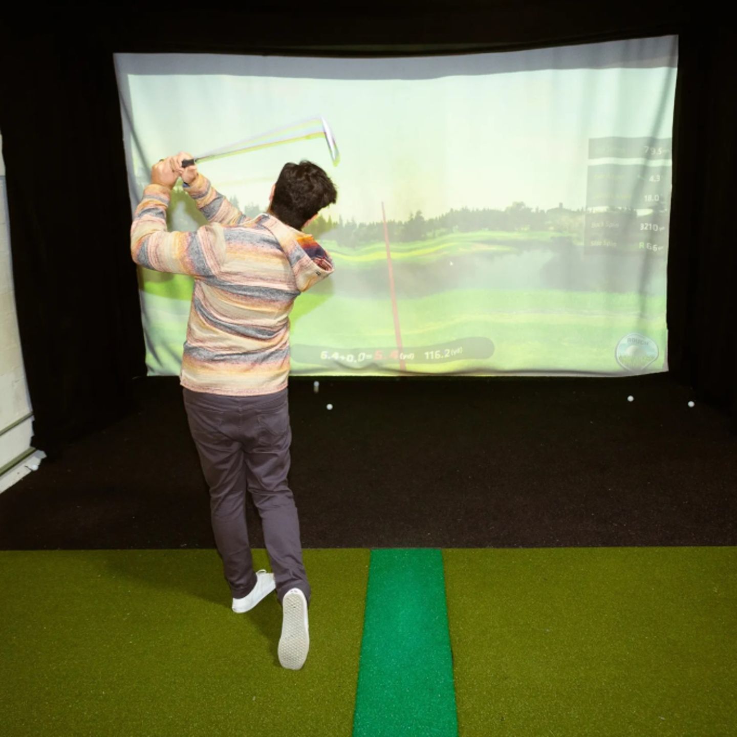 Person golfing