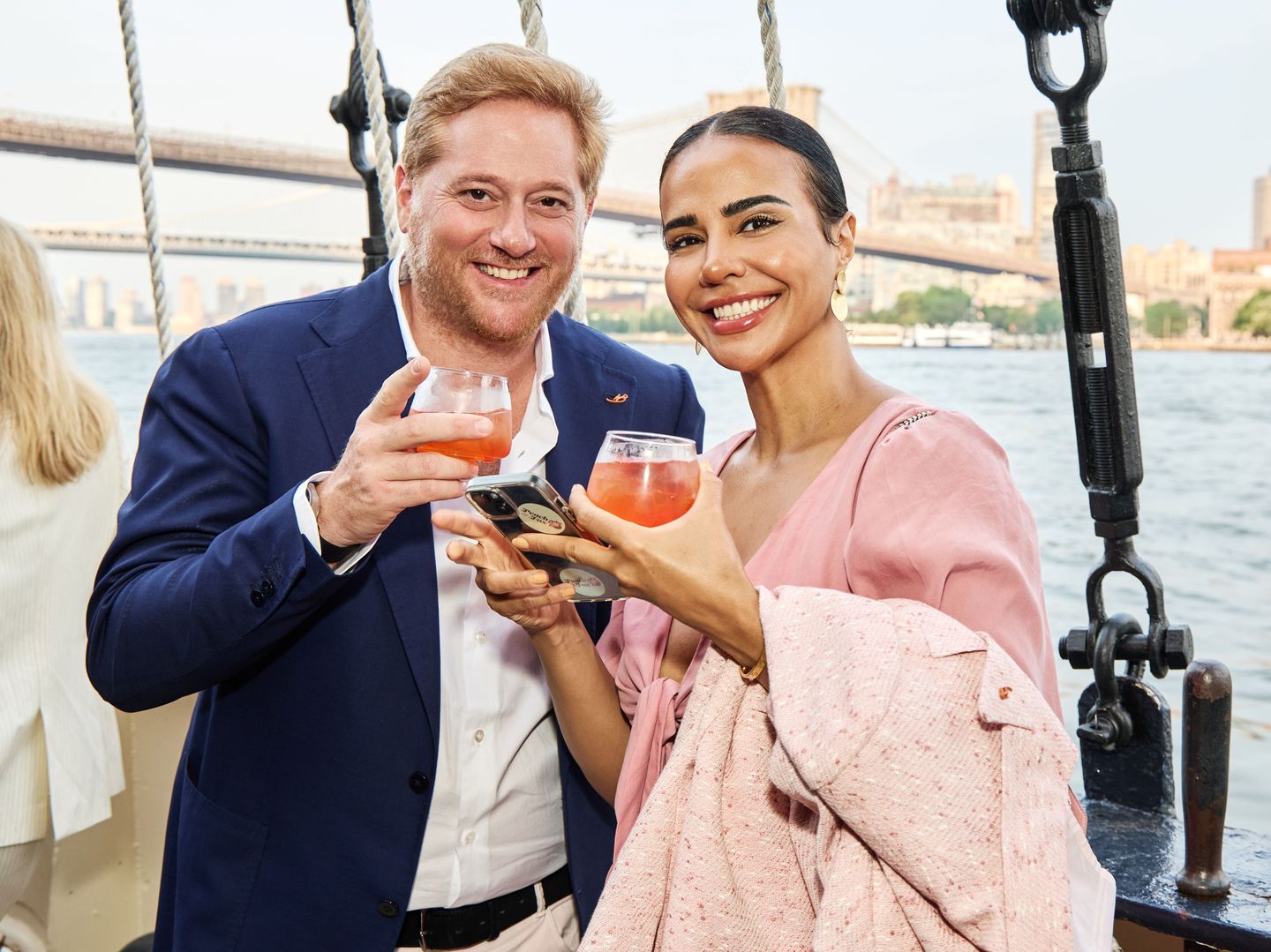 Couple on boat with drinks