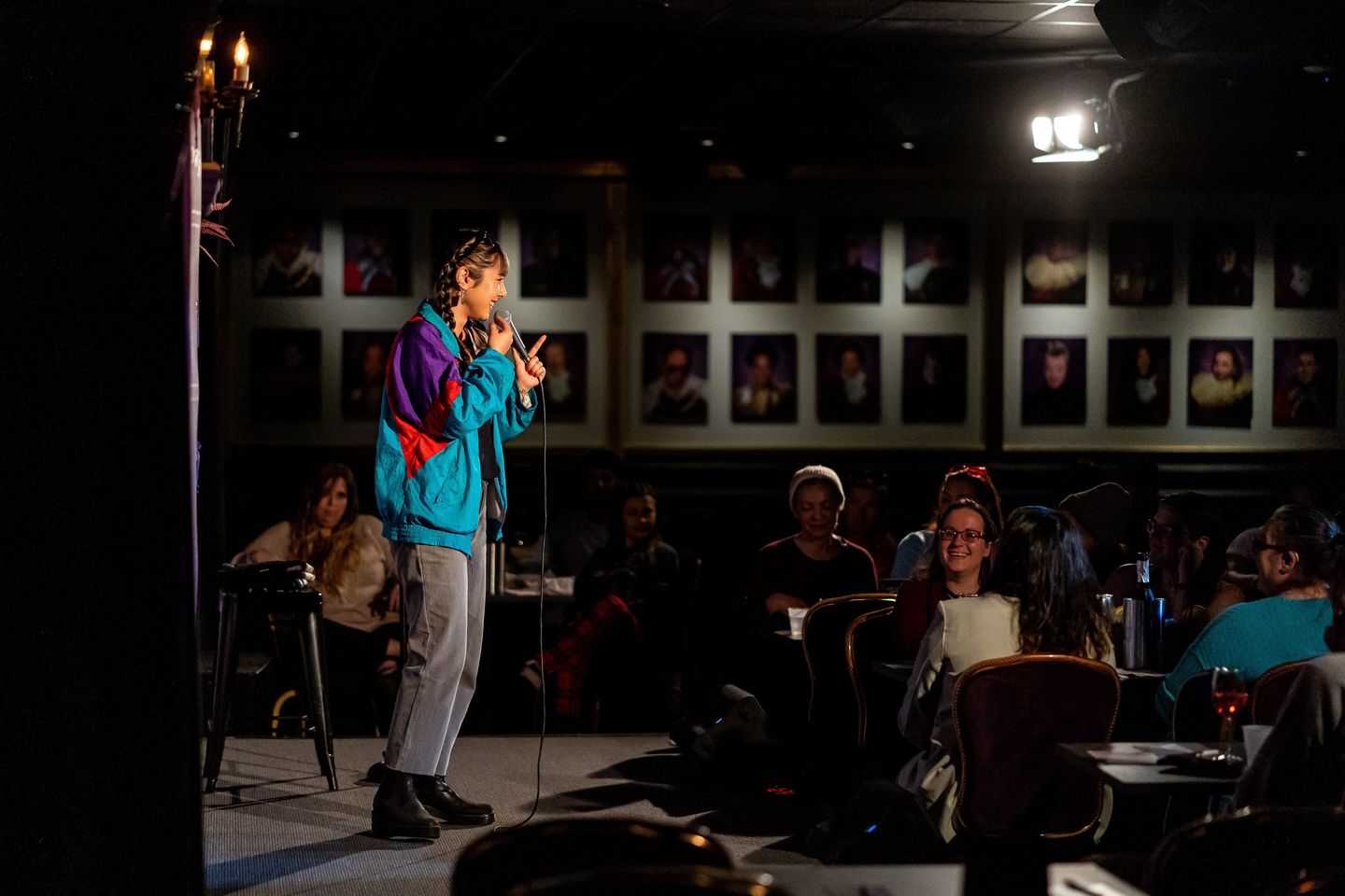 Comedian on stage with audience