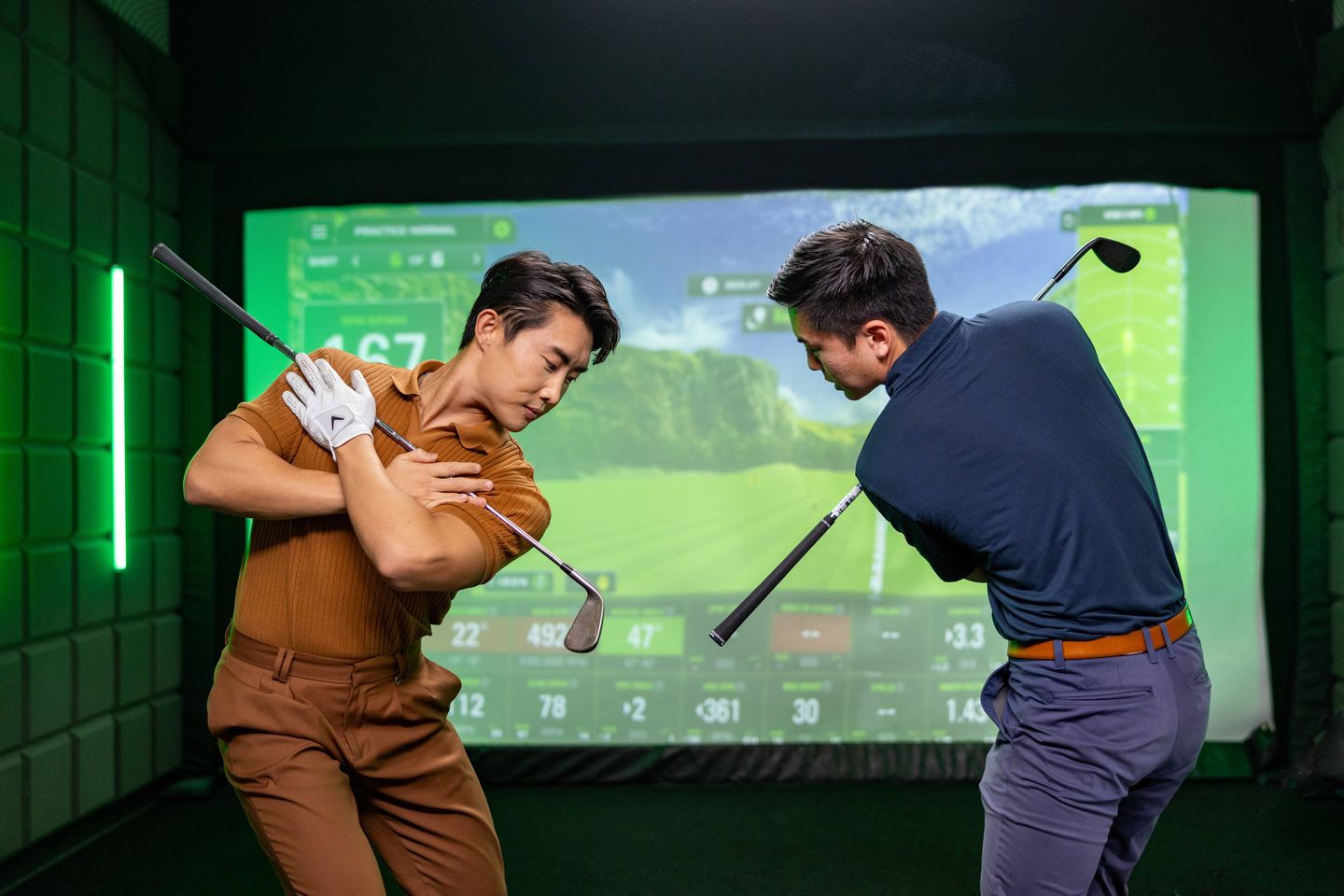 Two men working on technique