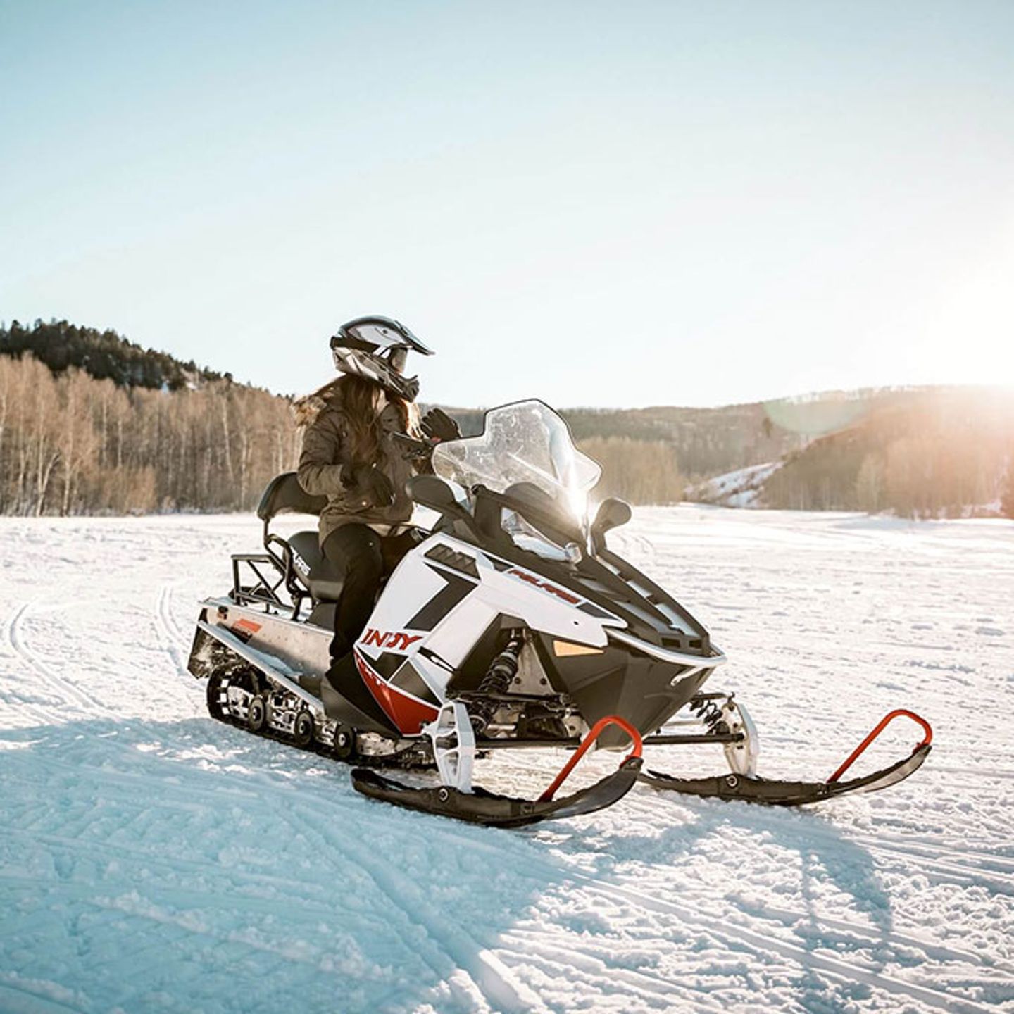 Woman  on Snowmobile 