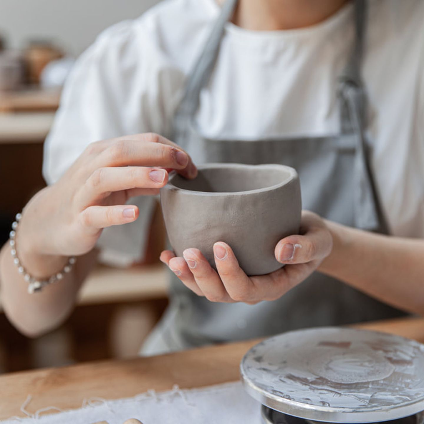 Person working clay