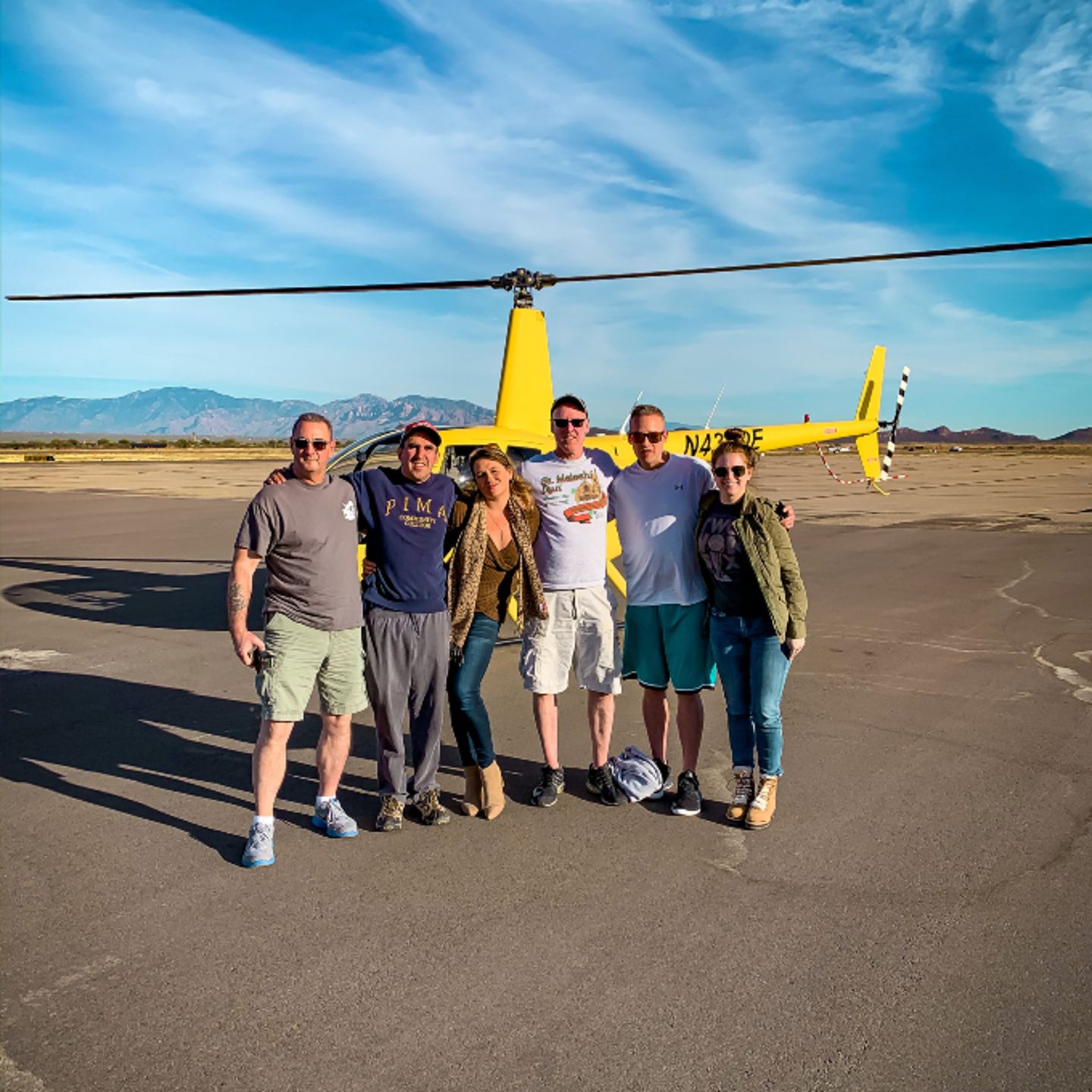 Group photo with helicopter