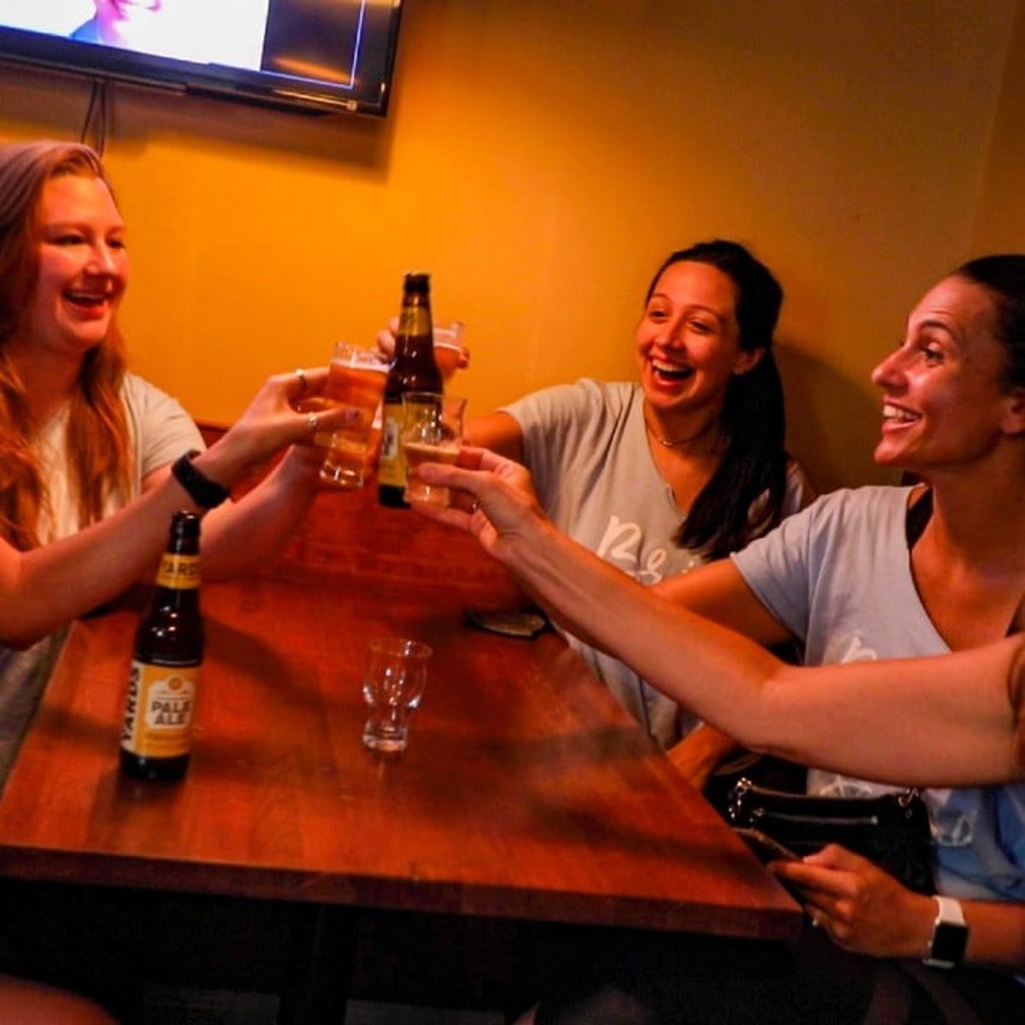 Woman drinking beers