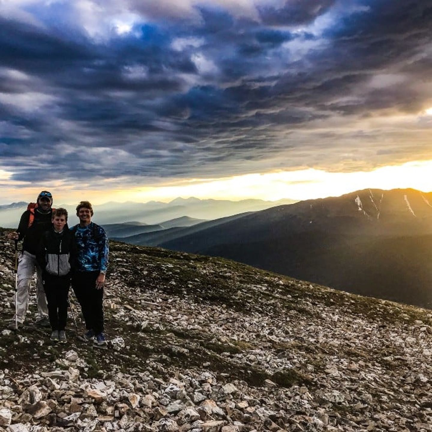 People on hike at sunrise