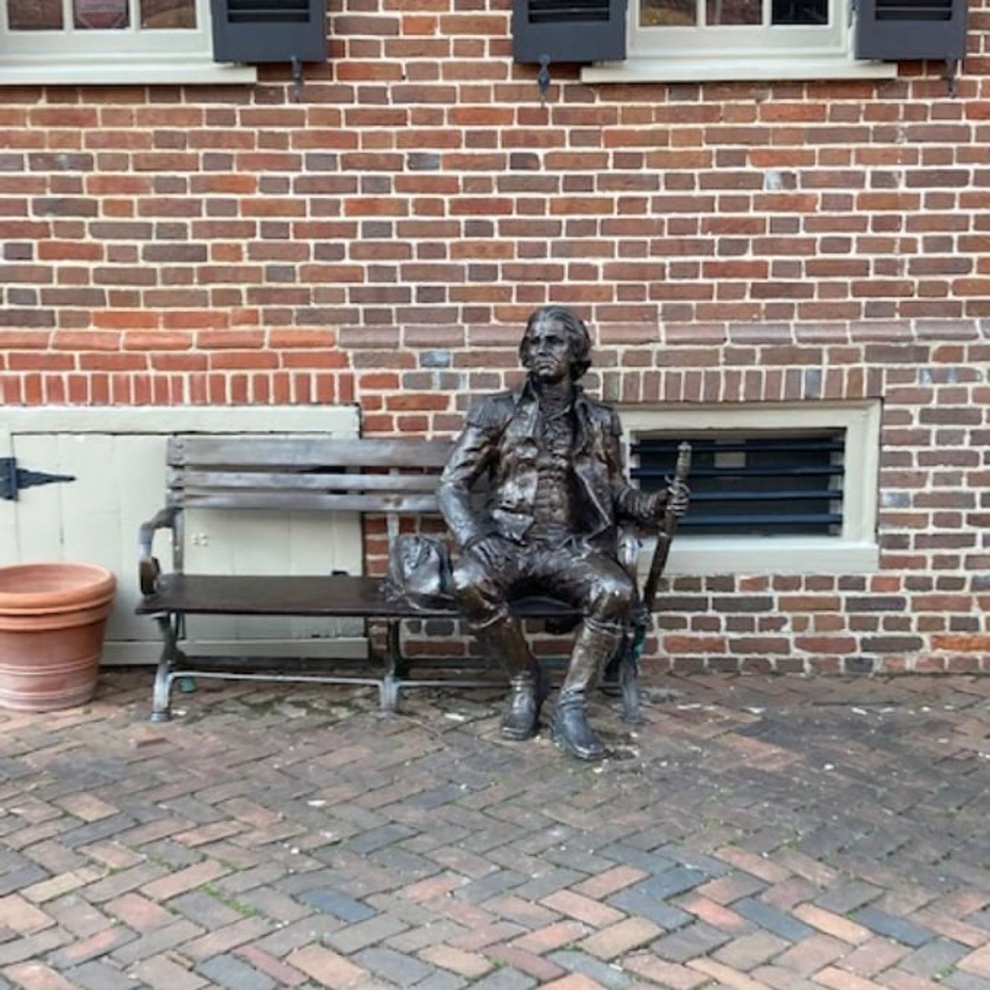 Statue on bench