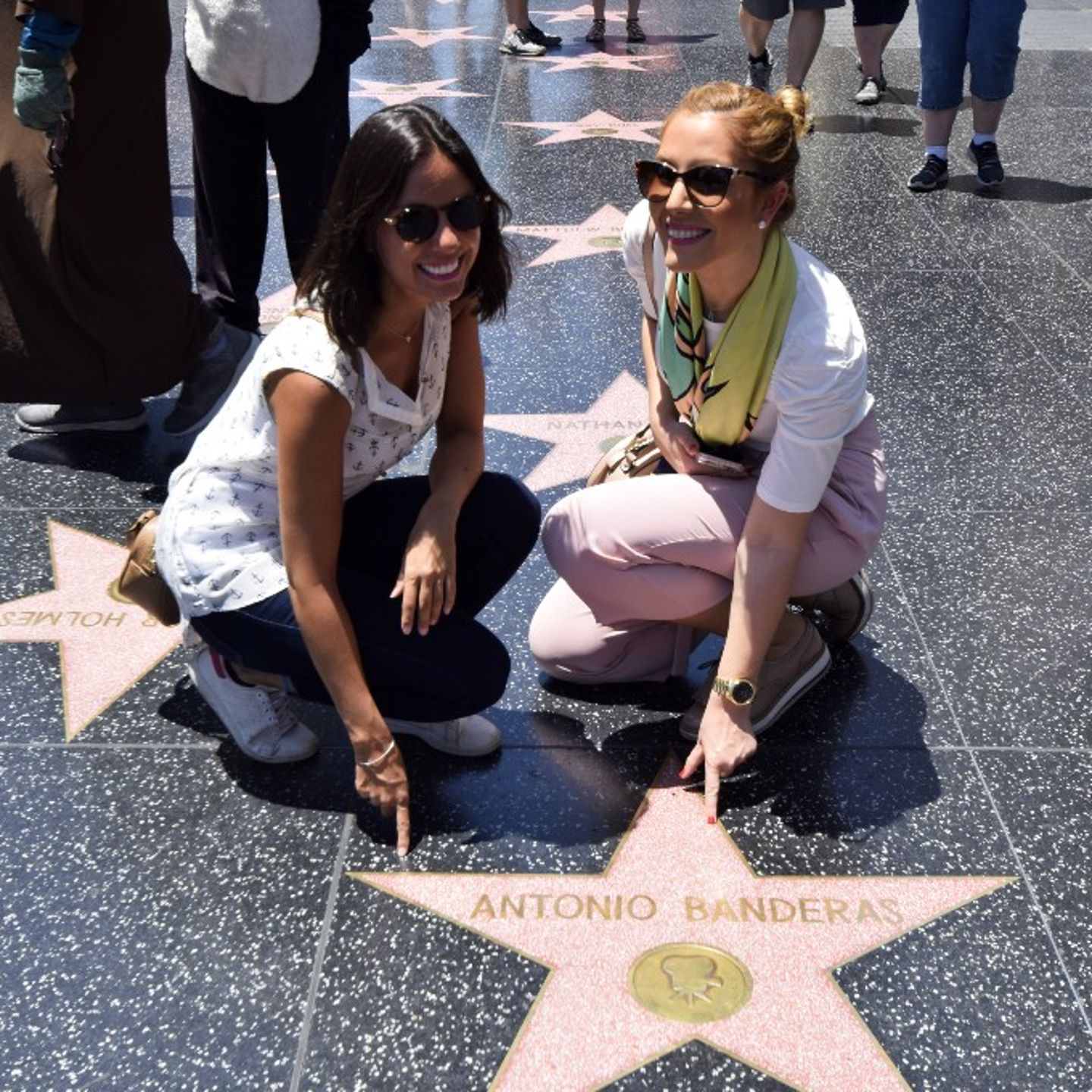 Two people with Hollywood Star
