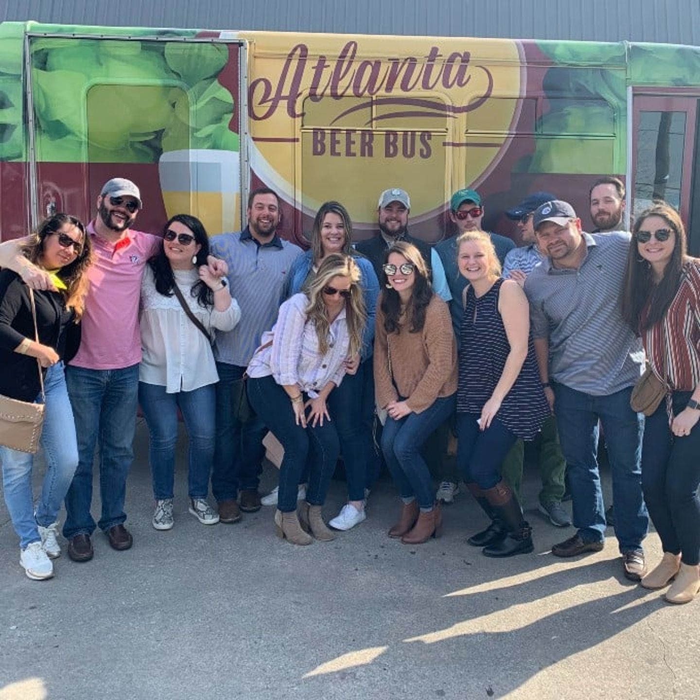 Group in front of beer bus