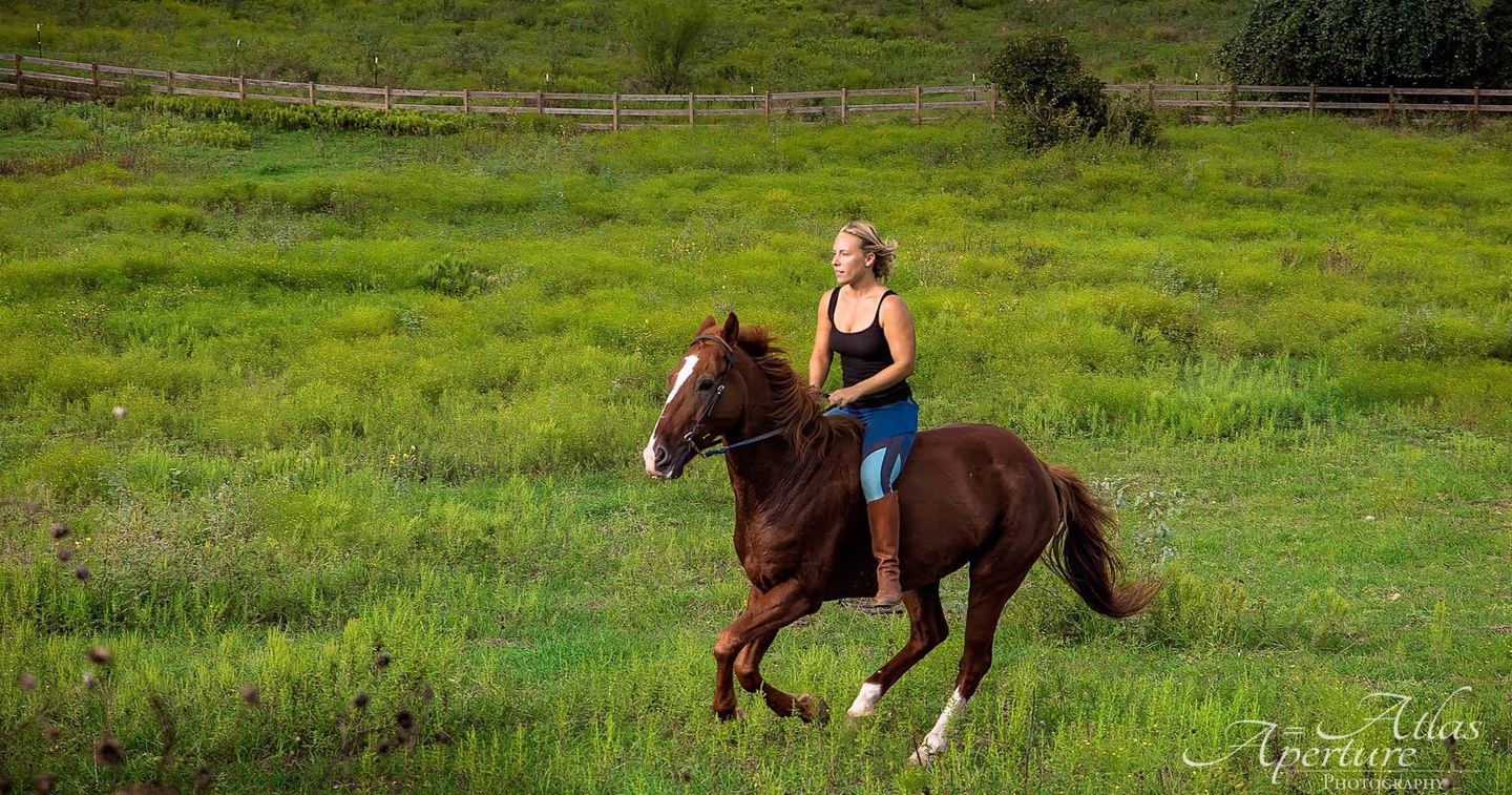 Woman riding horse