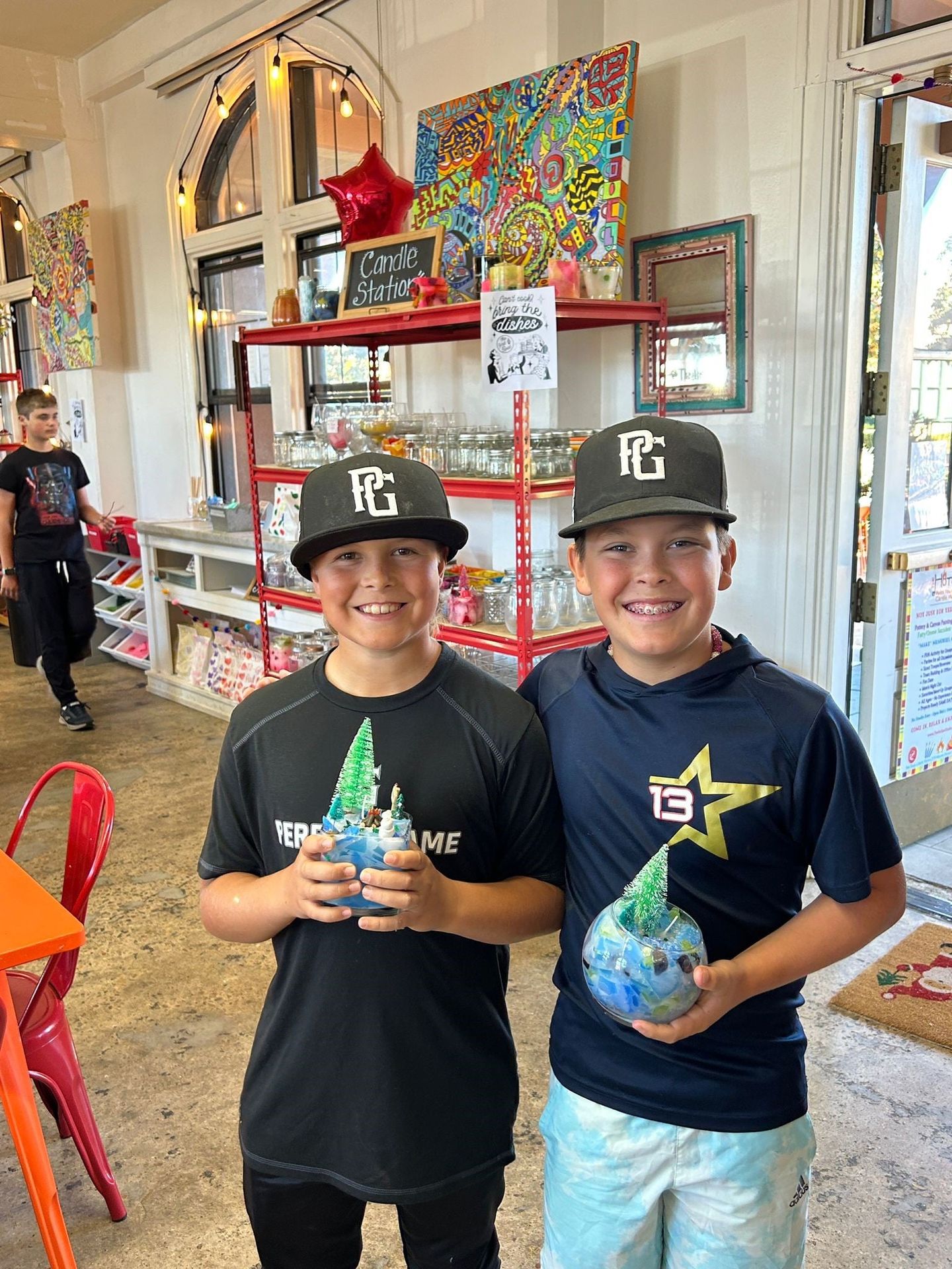 Two Boys Creating a Candle