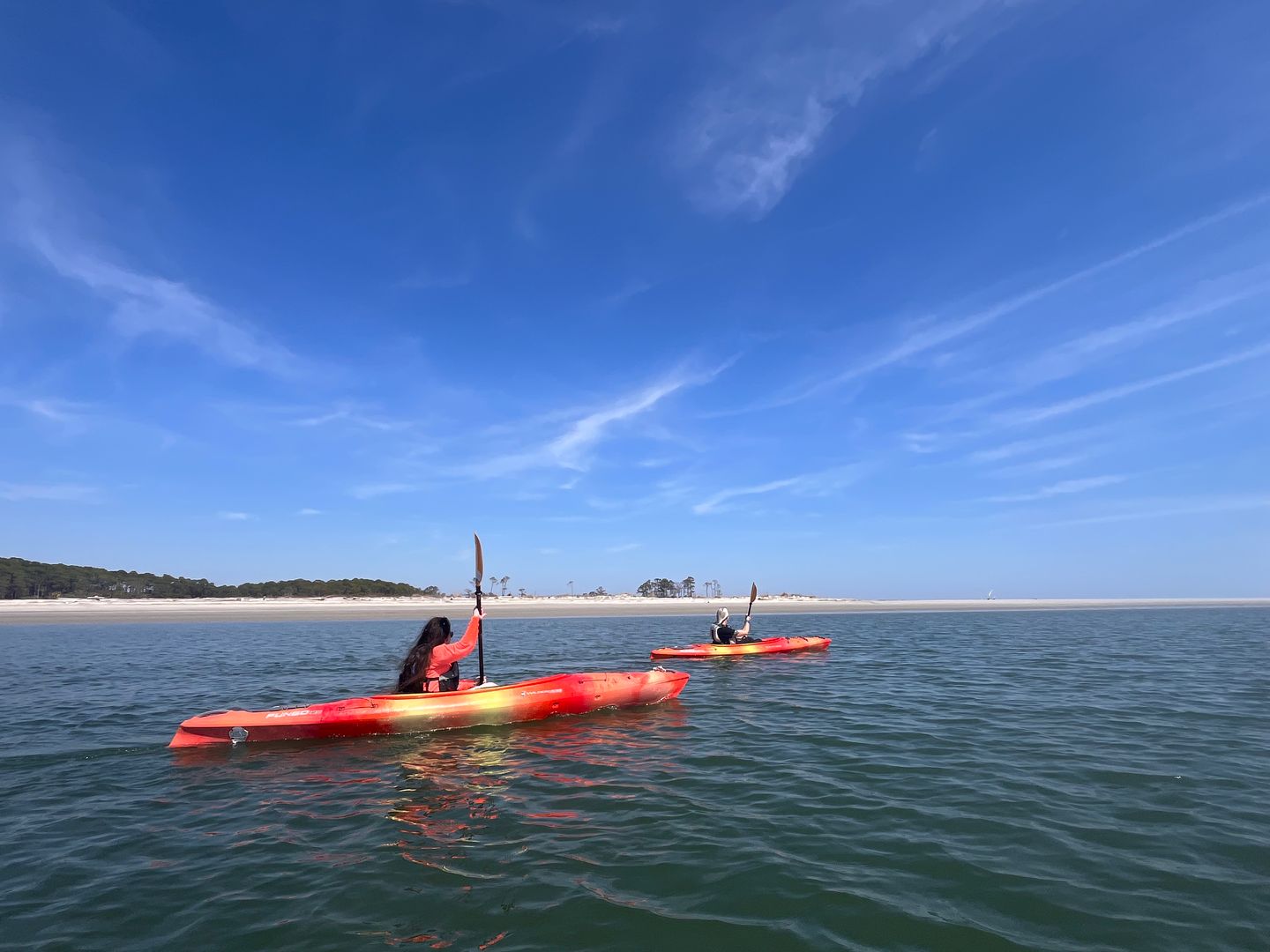 Two people paddling