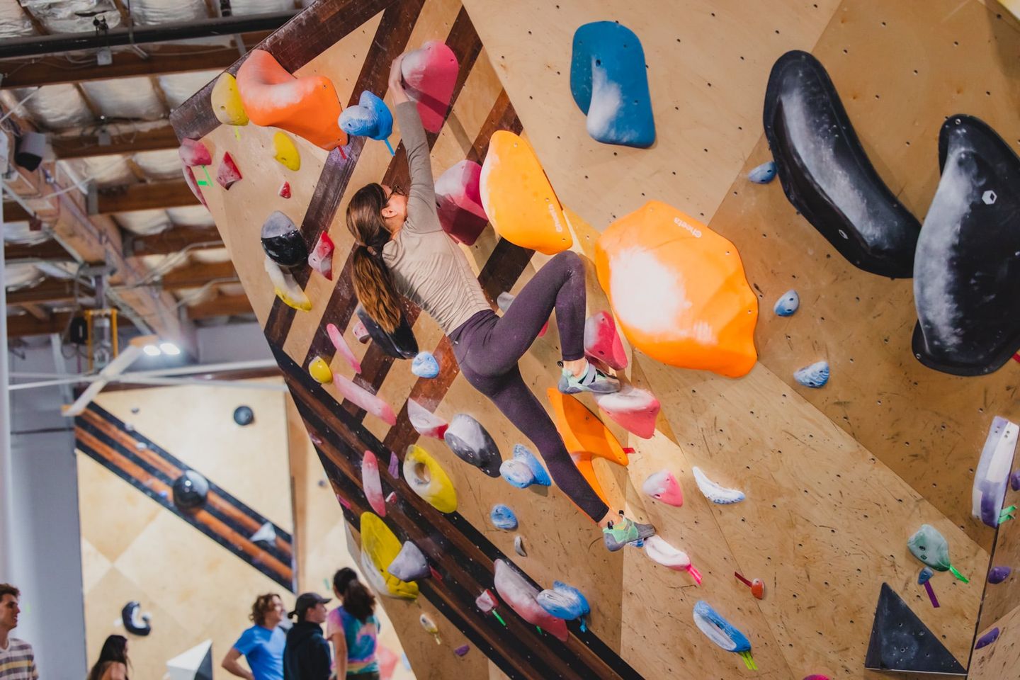 Woman on climbing wall