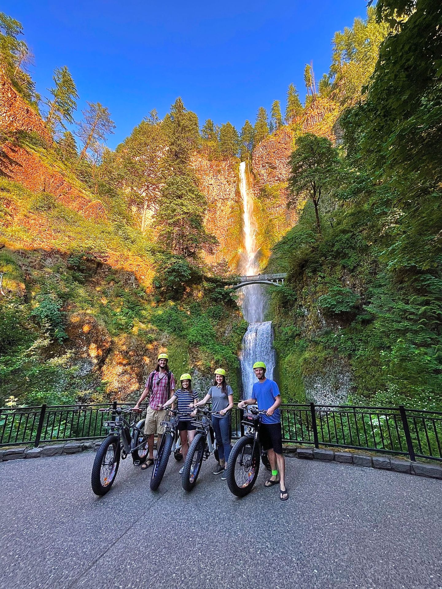 Group photo with waterfall
