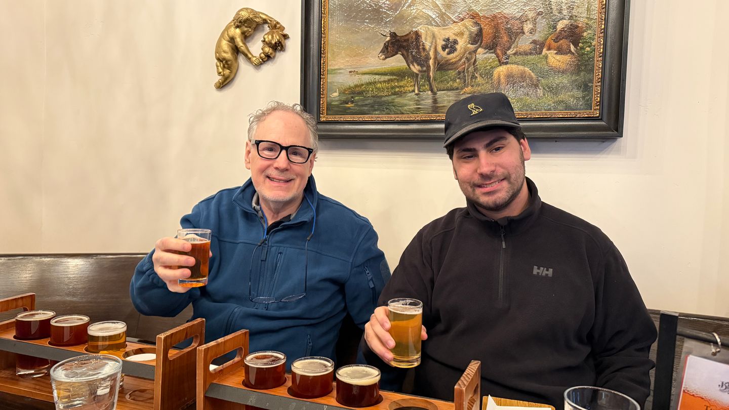 Men with beer flight