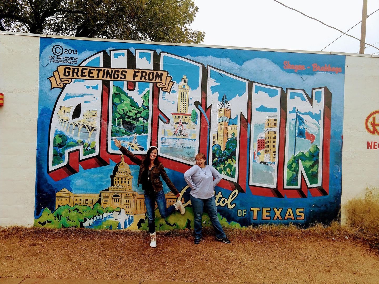 Couple in front of sign
