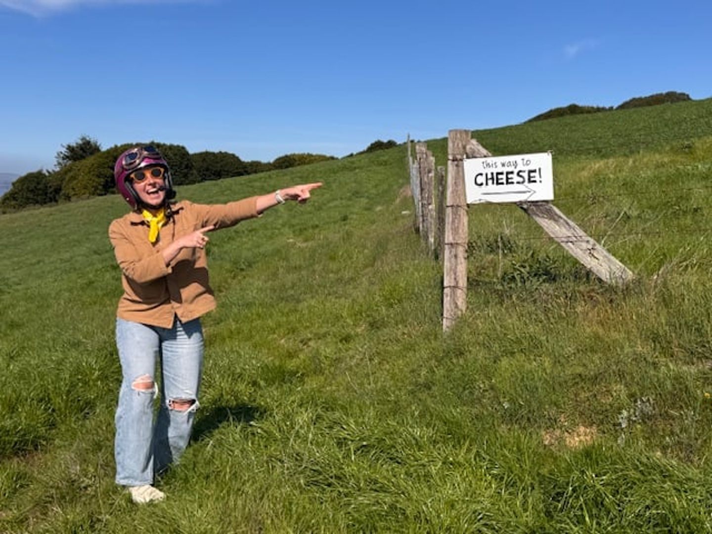 Cheese this way sign