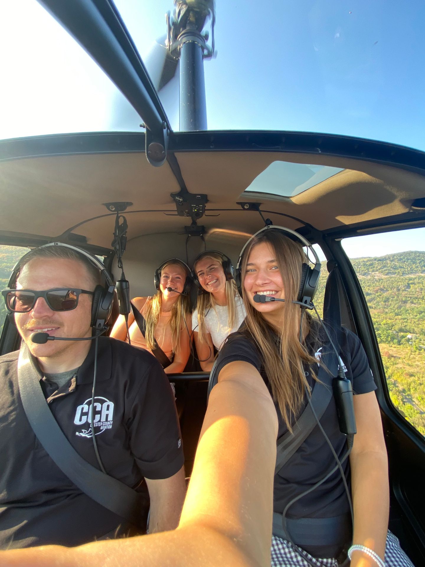 People flying in helicopter