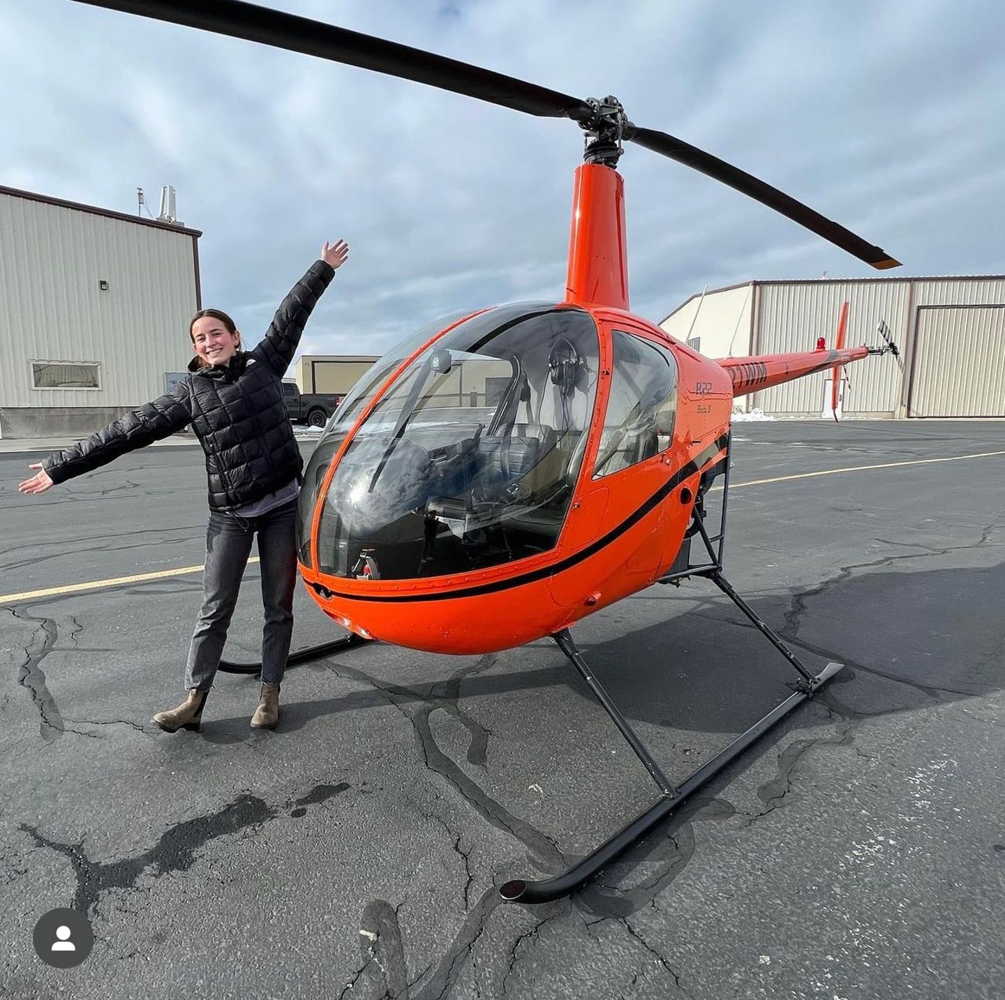 Person next to helicopter