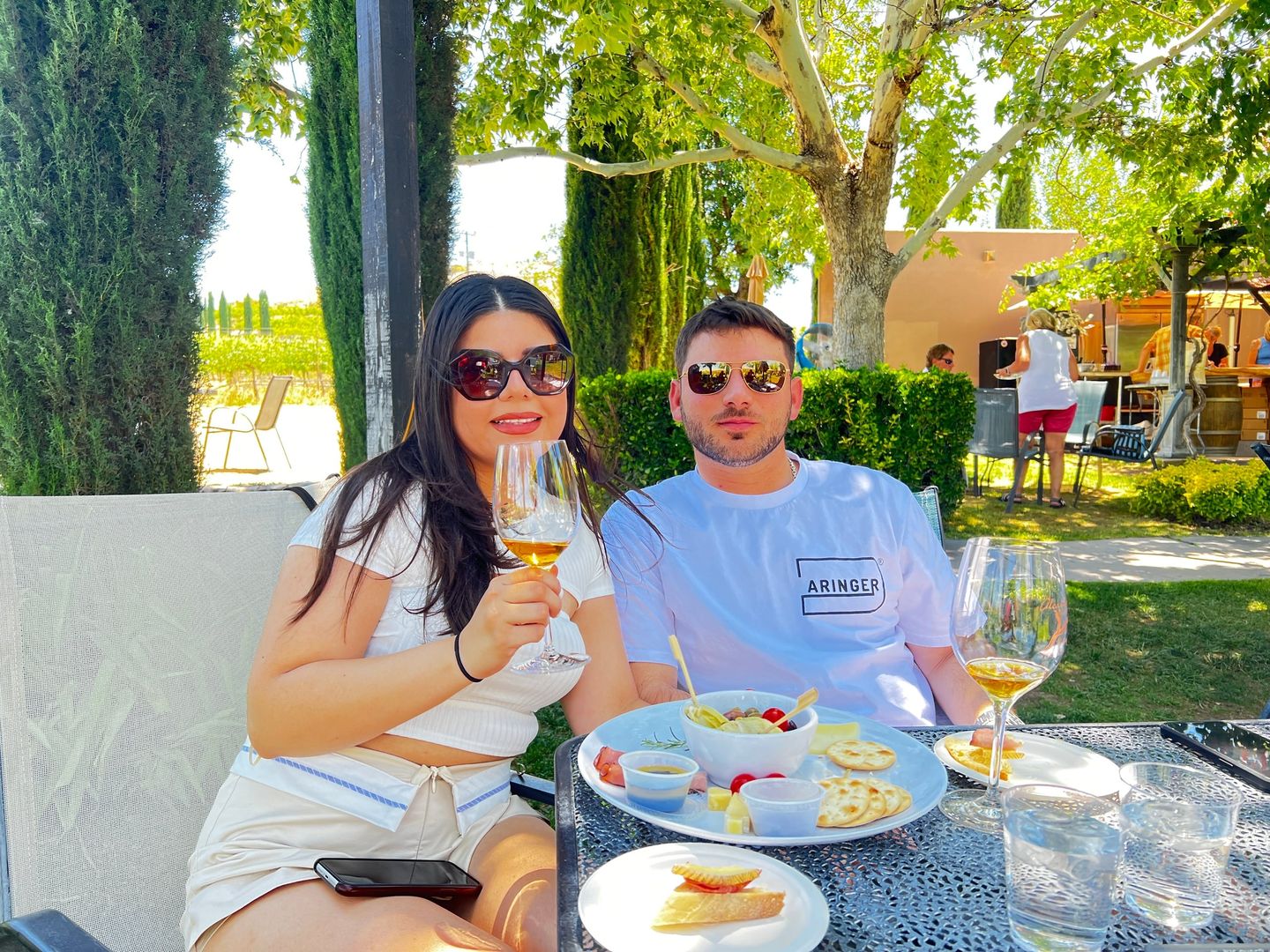 Couple enjoying wine and snacks