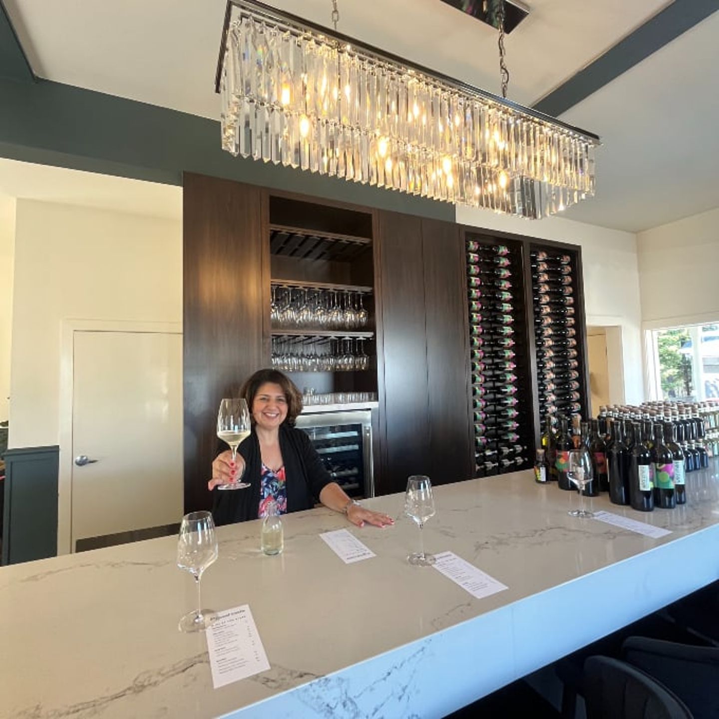 Woman with wine glasses