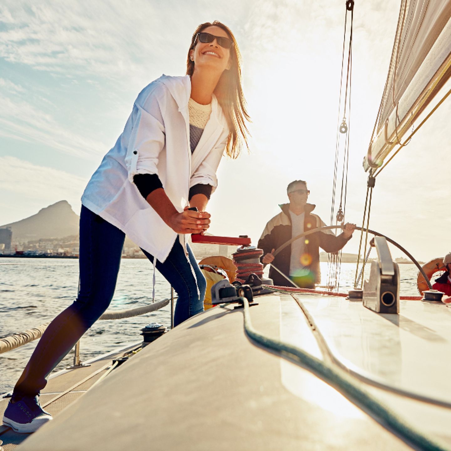 Woman learning to sail