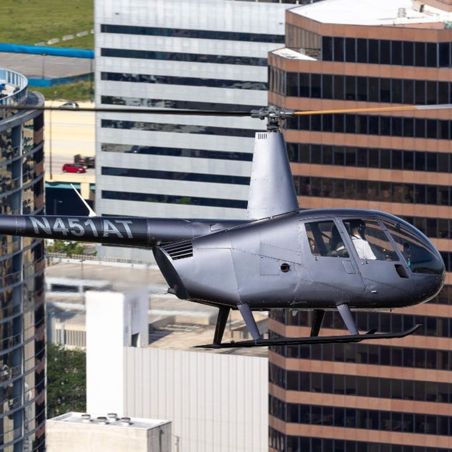 Helicopter flying in city