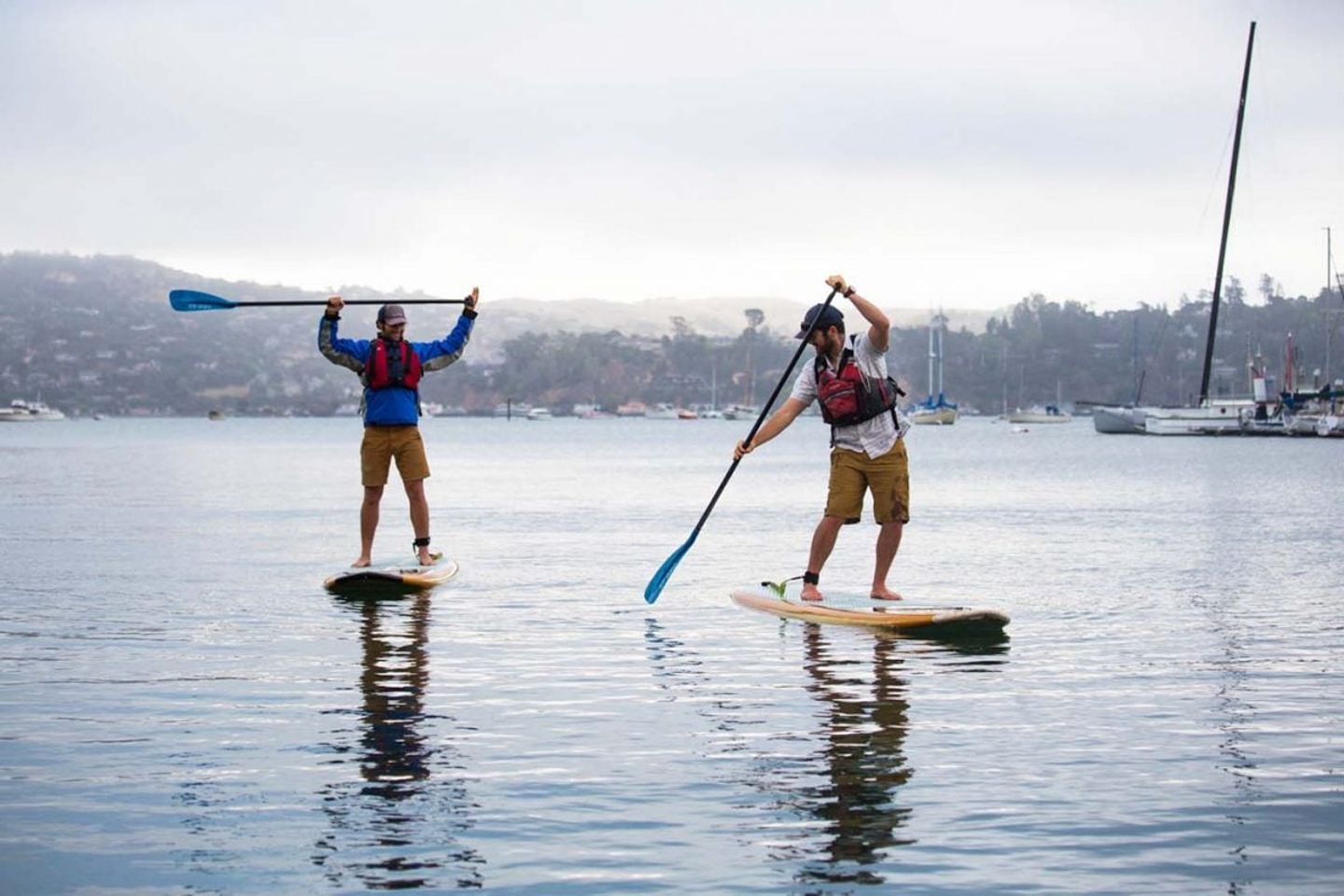 Two people paddleboarding