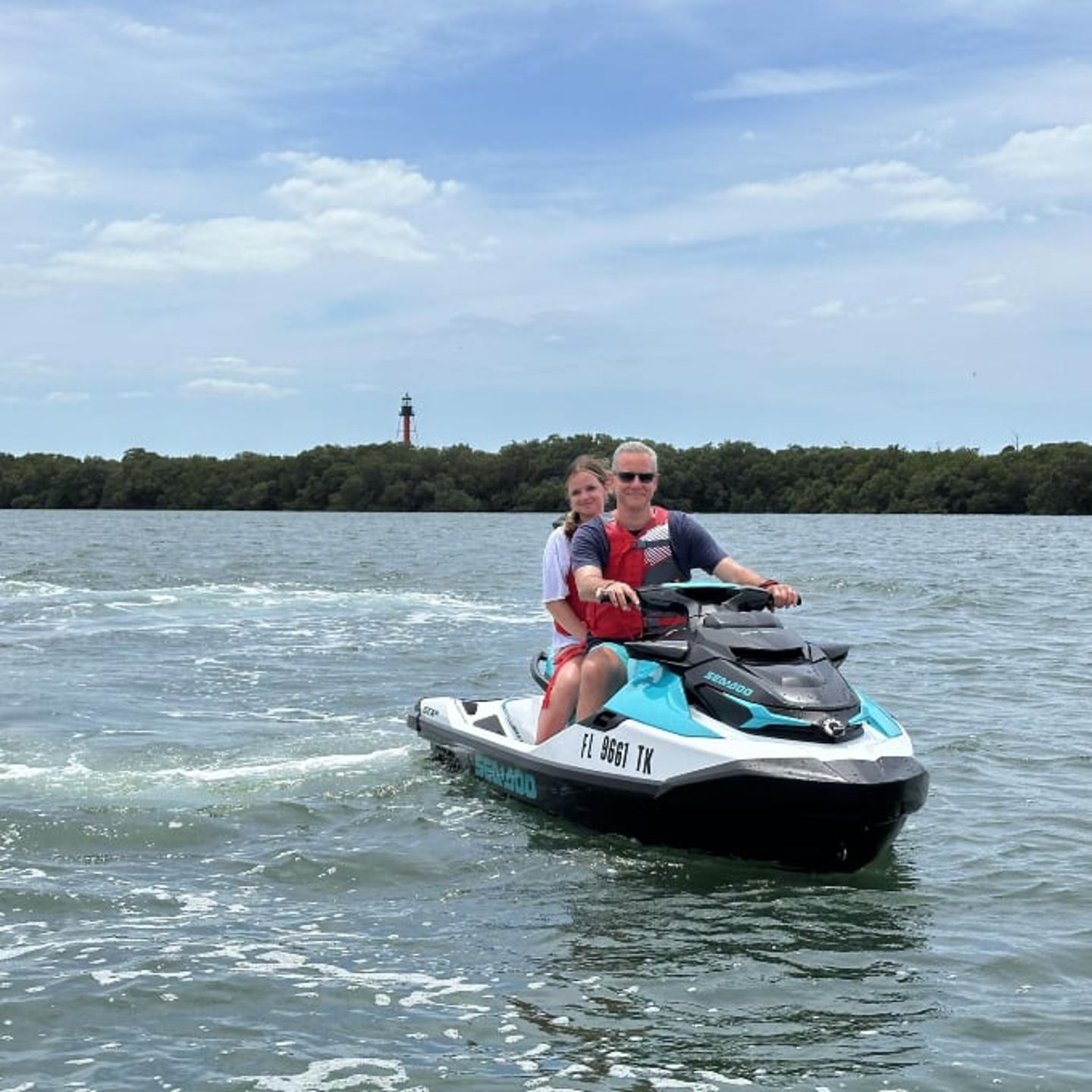 Two people on jet ski