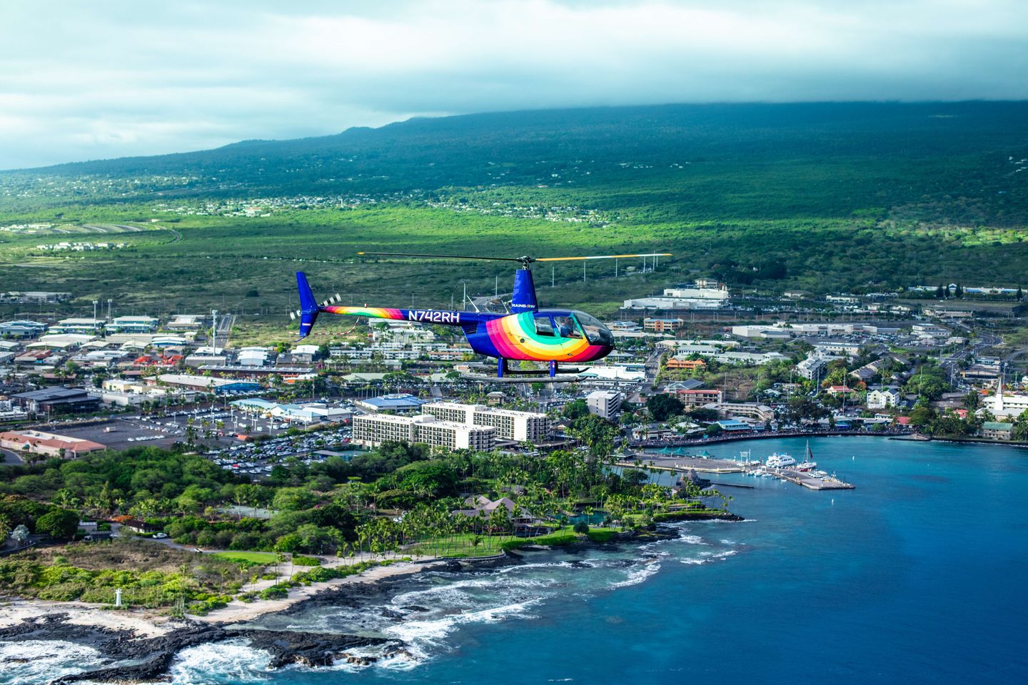 Rainbow helicopter on coast