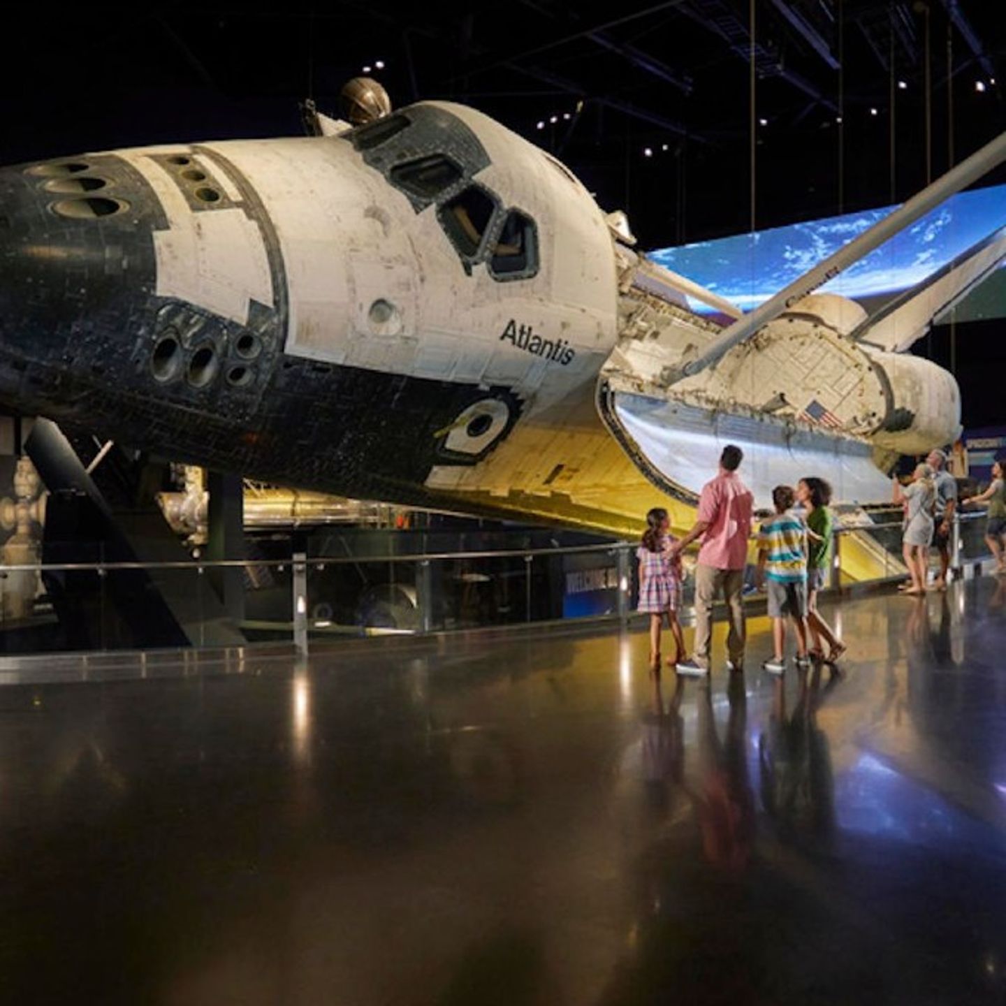 Group in front of space ship