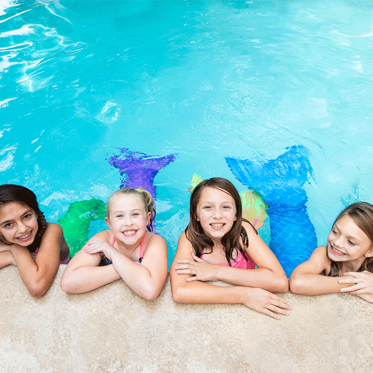Mermaids in pool