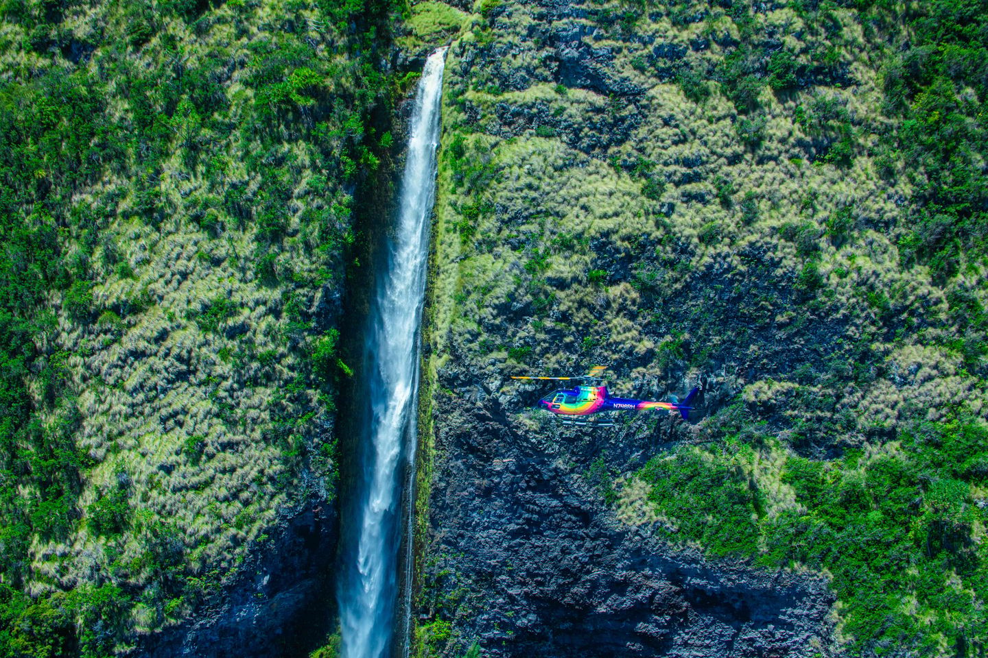 Helicopter near waterfall