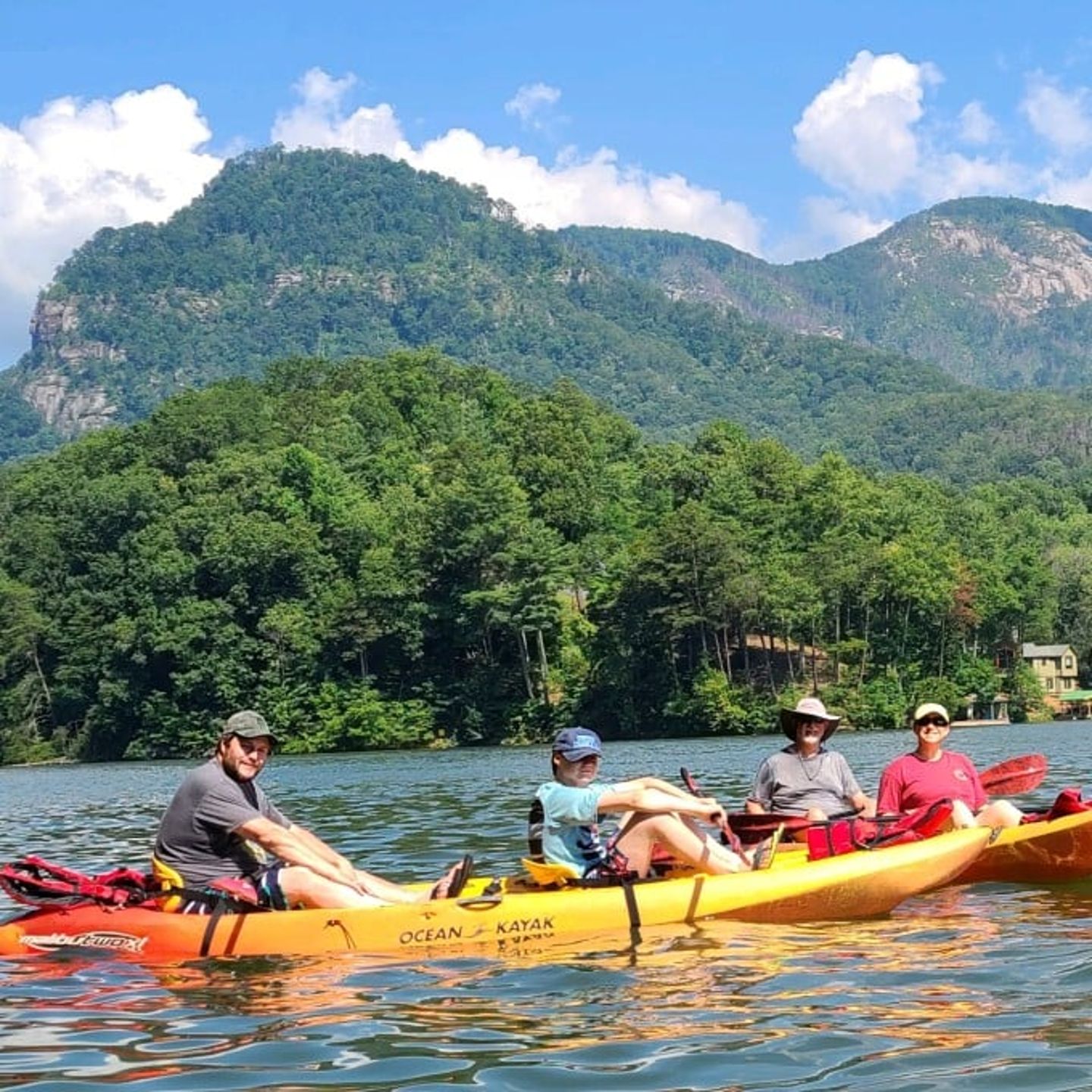 Group in kayaks on lake