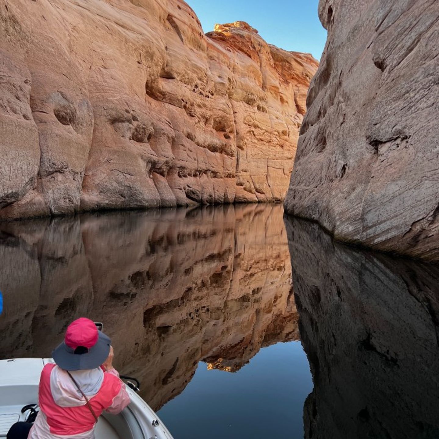 Woman Taking Photo of Rocks