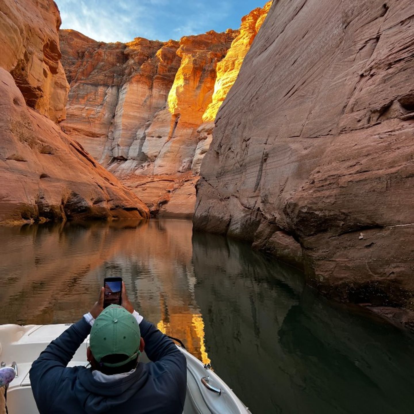 Man Taking Photo of Rocks